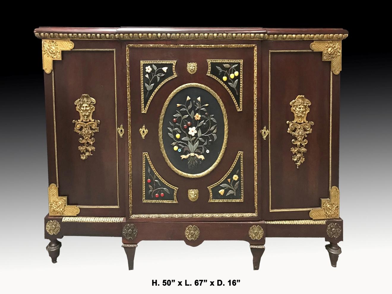 Exquisite French Napoleon III semi-precious stone Jeweled and ormolu-mounted three door cabinet.
19th century. 

Moulded breakfront wood top trimmed with gilt bronze egg and dart, above three doors revealing three shelving compartments and