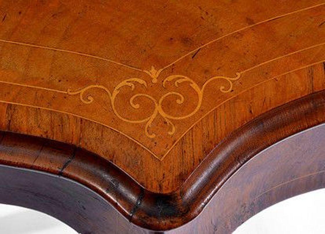 20th Century A French Serpentine Shaped Walnut Centre Table with Satinwood Inlay For Sale