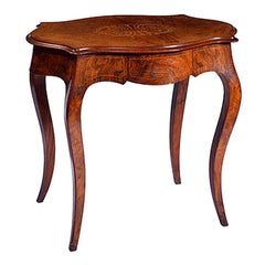 A French Serpentine Shaped Walnut Centre Table with Satinwood Inlay