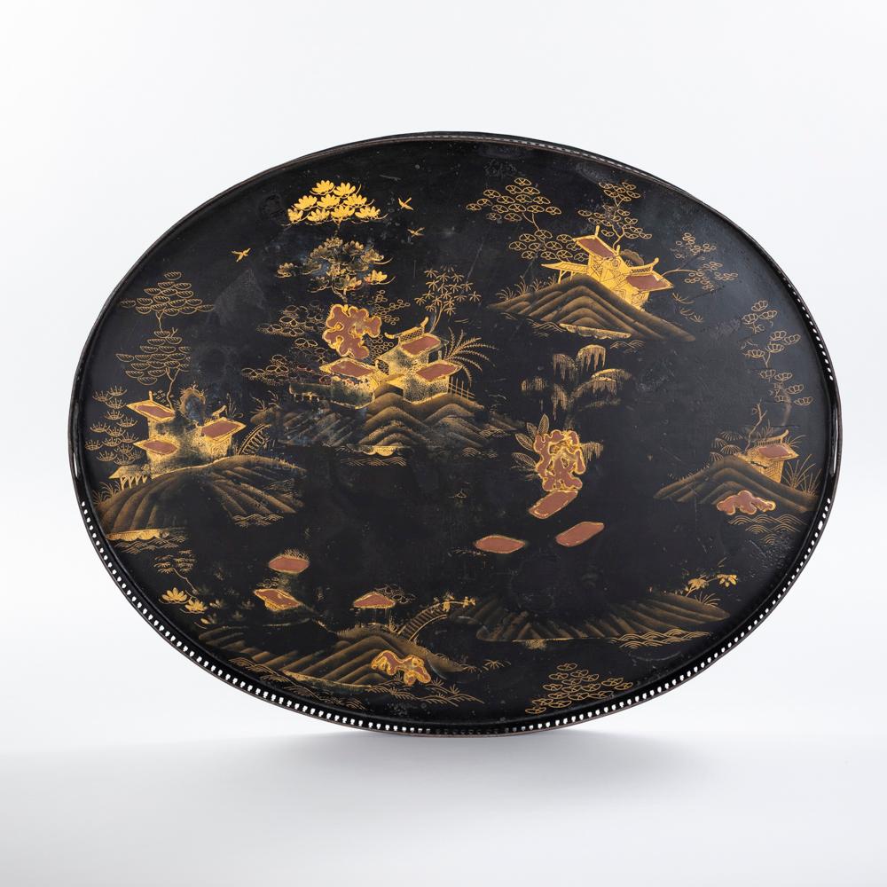Antique serving tray from France at the beginning of the 19th century. 
The oval metal tray has an all-round gallery border with 2 handles. 
The gallery border has a beautiful hand-punched linear decoration, the upper edge is slightly rounded, 
the