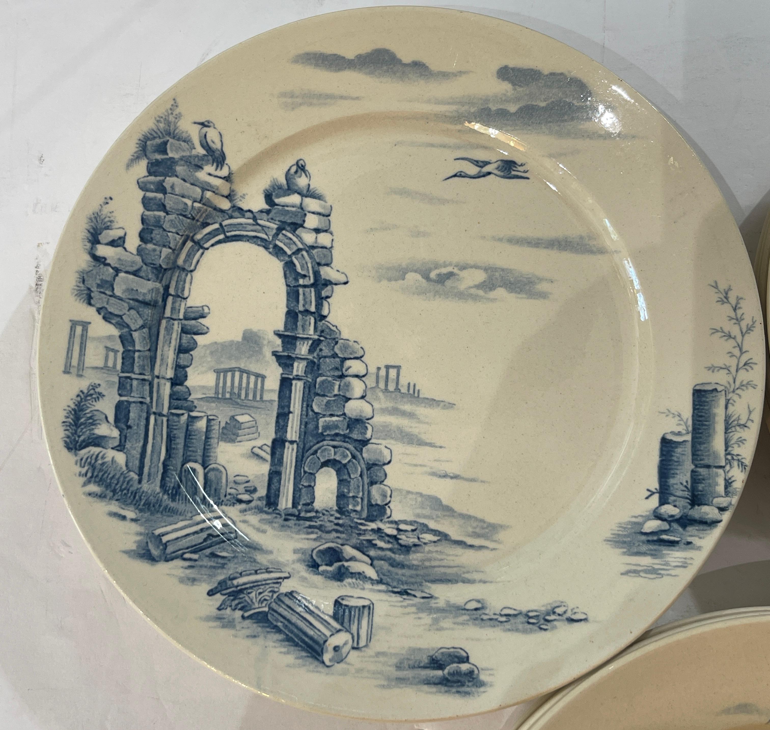 Juego francés de 12 platos arquitectónicos de loza azul y blanca, Gien, C.1900 principios del siglo XX en venta