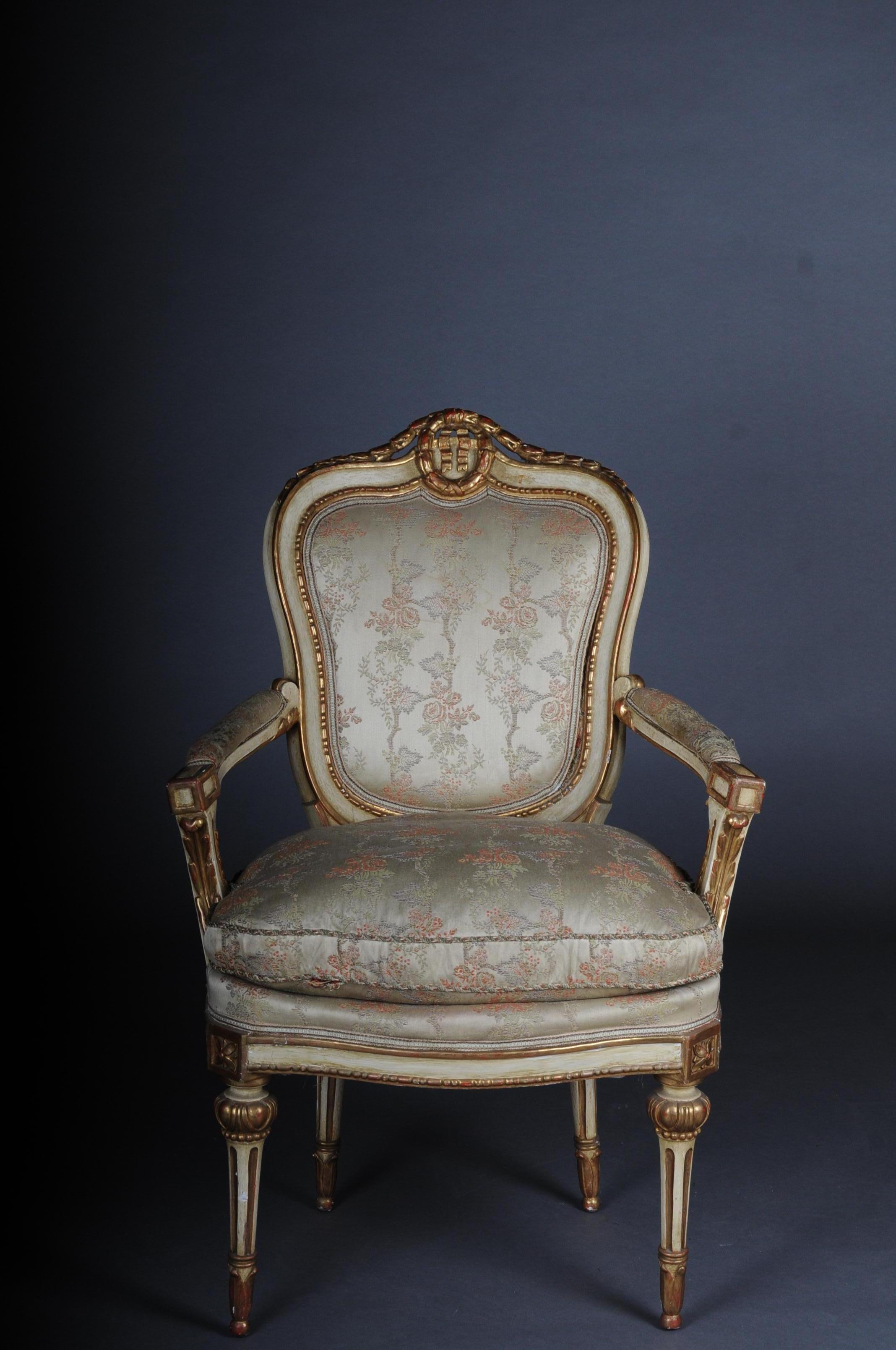 French set of 18 salon chairs / armchairs, Napoleon III

Extensive and very rare Louis XV salon seating group consisting of 8 armchairs and 10 chairs.
Solid wood, painted cream and partly gilded. Cambered and carved frame on curved feet.
The