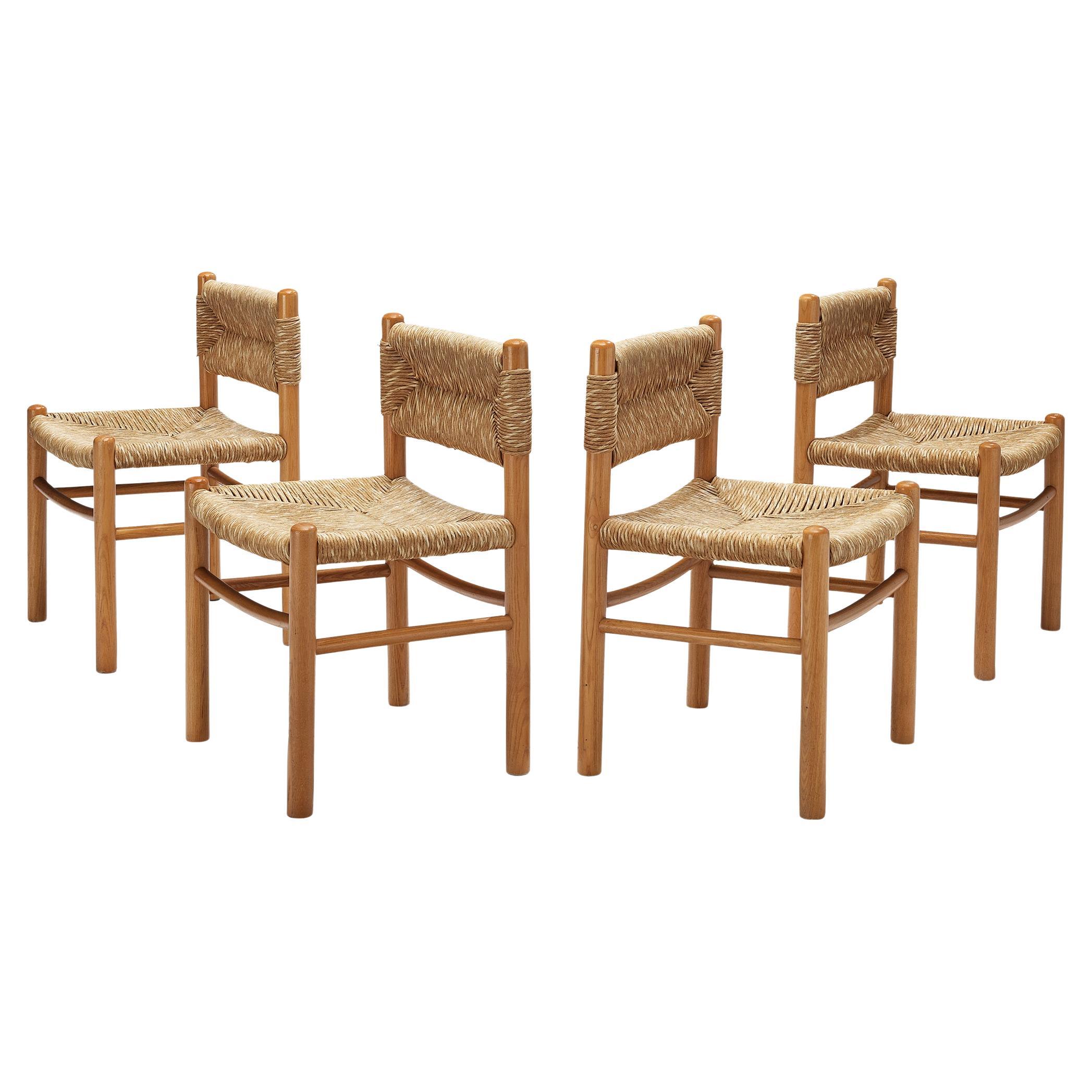 Ensemble français de quatre chaises de salle à manger en frêne et paille 