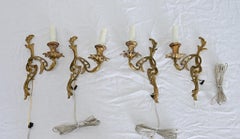 French Set of Four Louis XV Style Bronze Wall Sconces