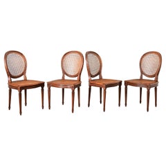 French Set of Four Louis XVI Style Cane Dining Chairs