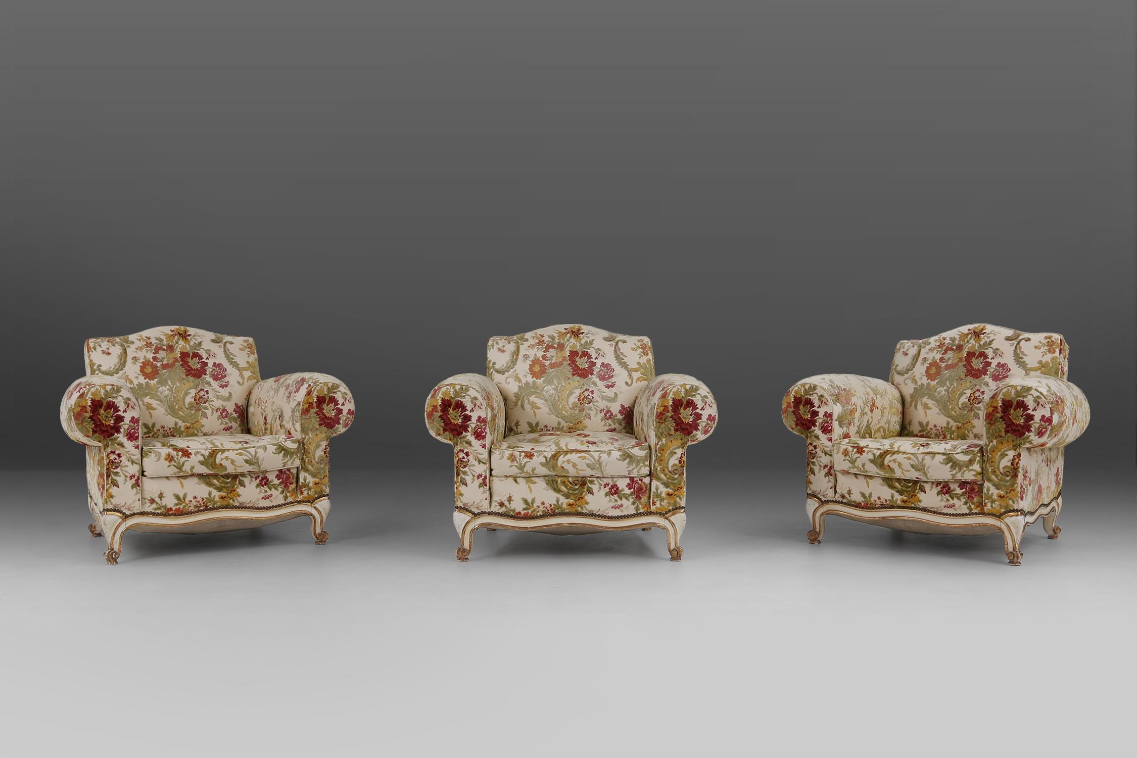 Set of tree french armchairs that have a elegant curve of the backrest and the large, bulky armrests that provide the sitter to lay down their arms comfortably. This design is ably employed as either the heart of a decor or its focal point thanks to