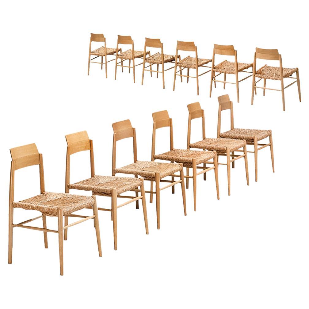 Ensemble français de douze chaises de salle à manger en bois et paille 