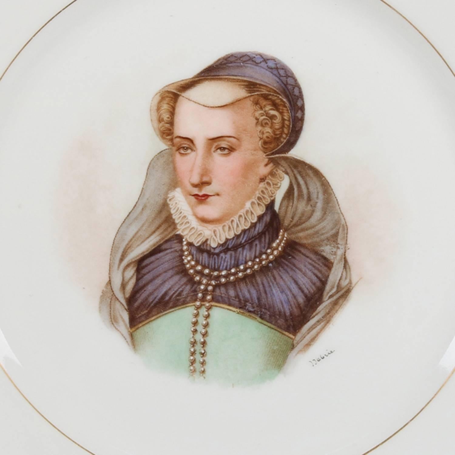 Antique French porcelain portrait plate by Sevres for Chateau de St cloud features well with central artist signed portrait of Jeanne D'Albret by Debrie and framed with gilt repeating and stylized fleur de lis pattern, rim with gilt scalloped edges