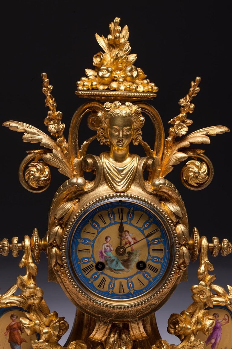 French Sèvres Porcelain Clock Set For Sale at 1stDibs