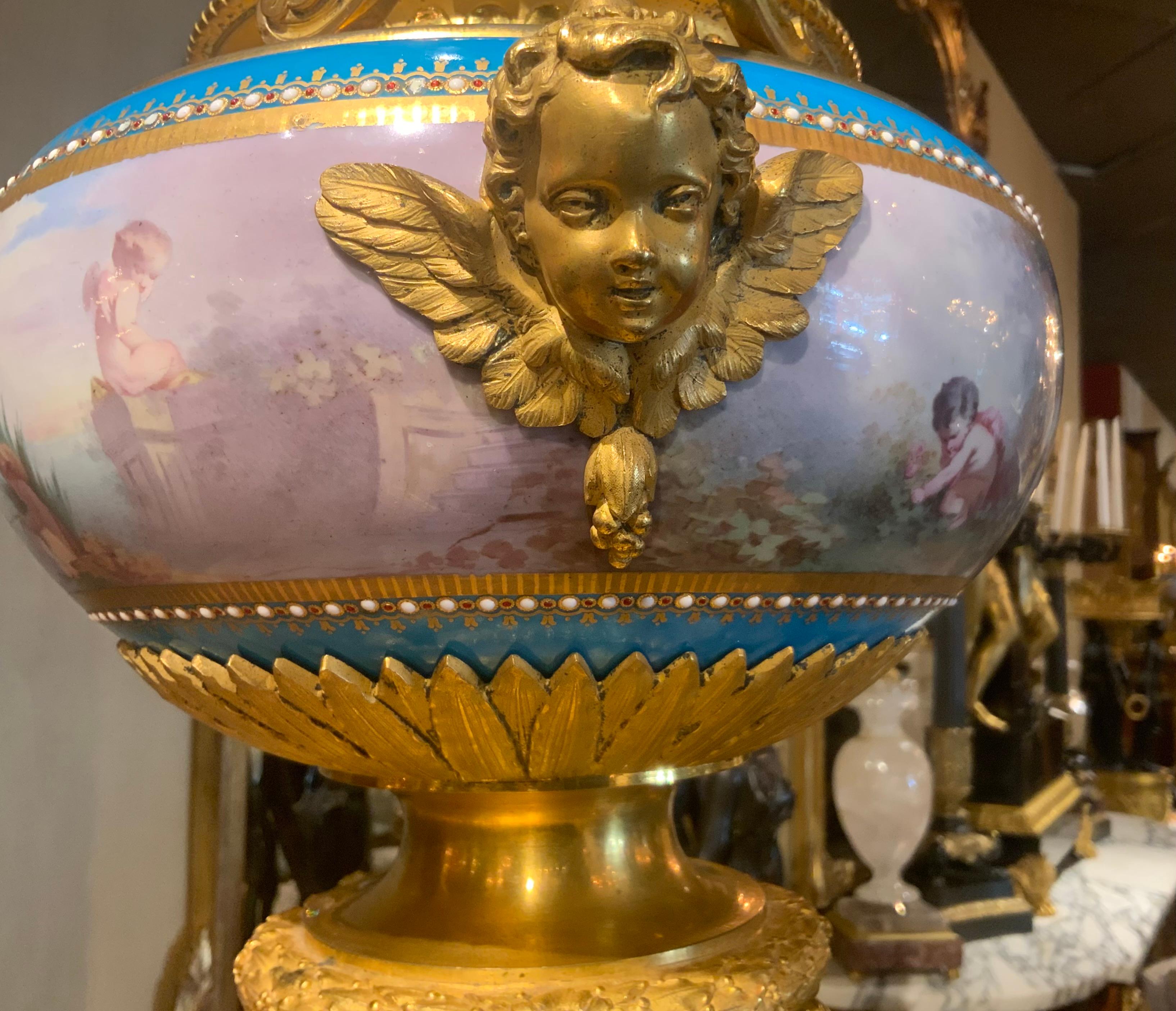 Gilt French Sevres porcelain jardineres in Celeste blue and gilt bronze mounts For Sale