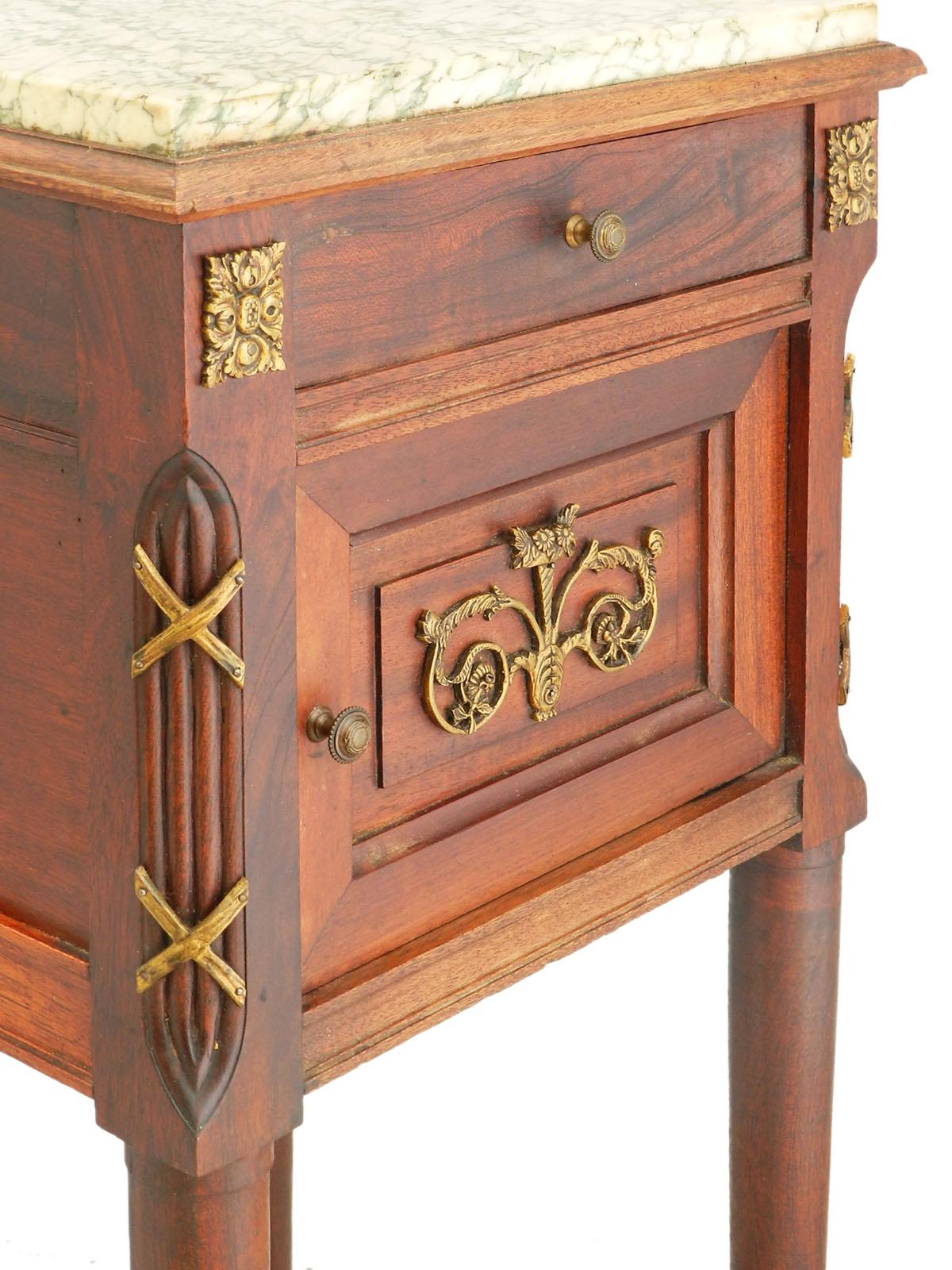 19th century side cabinet French nightstand, bedside table, circa 1880-1890
Solid mahogany with gilt bronze ormolu decoration
Single drawer
Cupboard with porcelain liner that can be removed if preferred
Variegated marble top
As removed from a