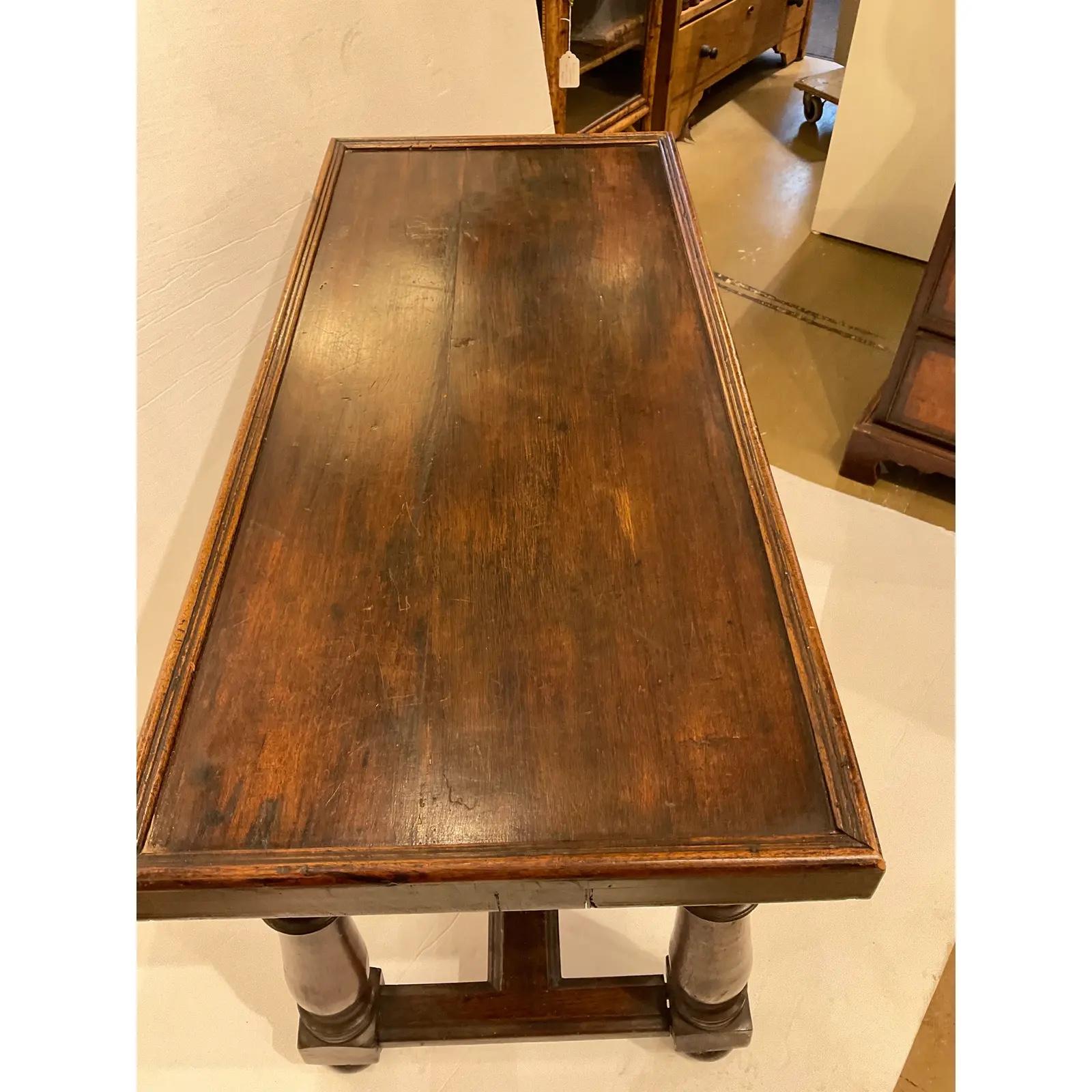 This 19th Century French side table has a simple but appealing style. There is ridged detailing along the top and legs that adds to the class of this piece. This accent table would go well in any room of the house!  #169