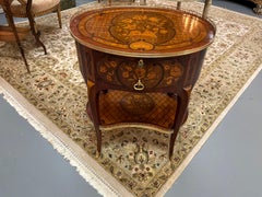 French side table with marquetry inlay and gilt bronze mounts
