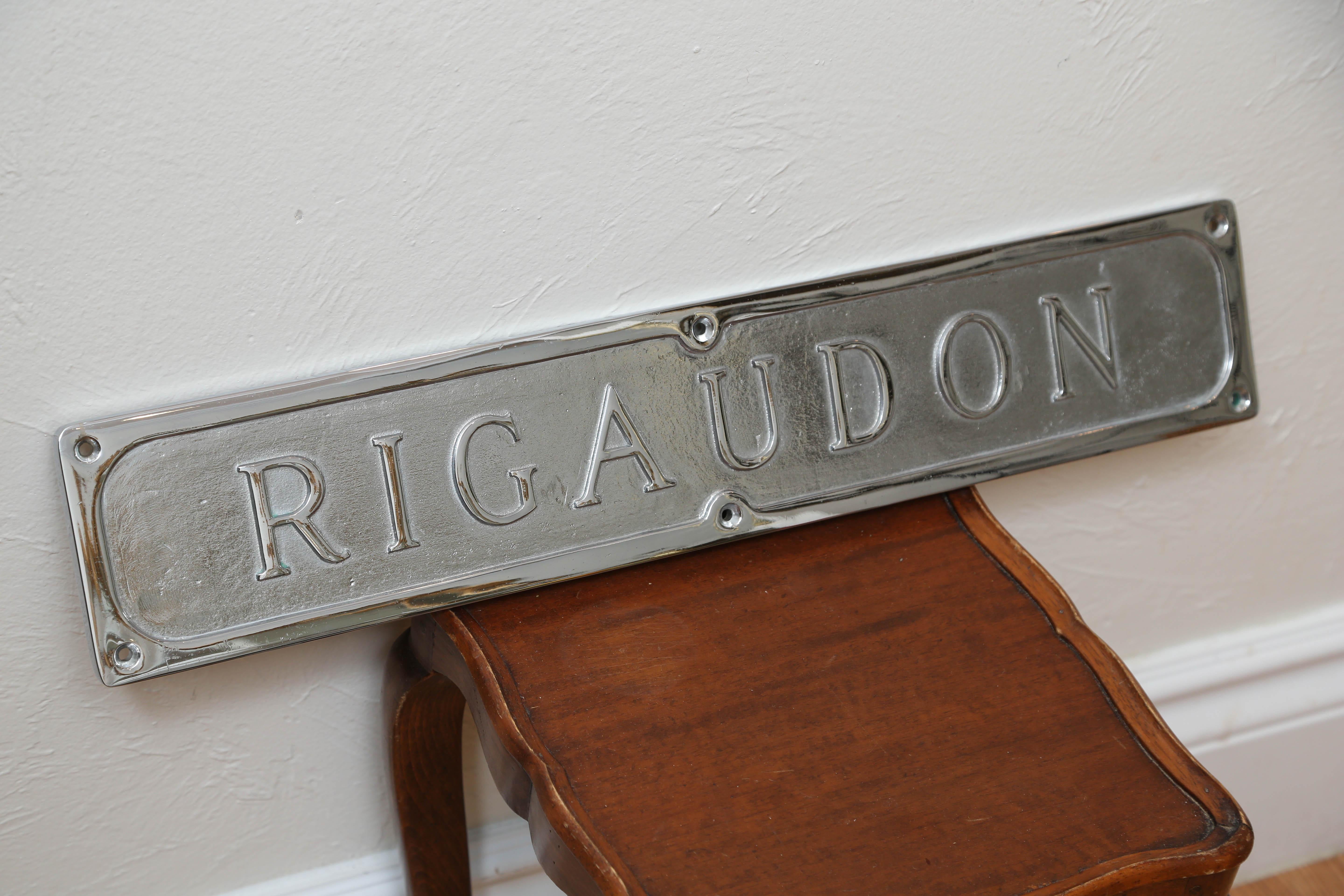 Rigaudon plated sign which means lively dance. Comes from the French, 17th century Baroque folk dance.