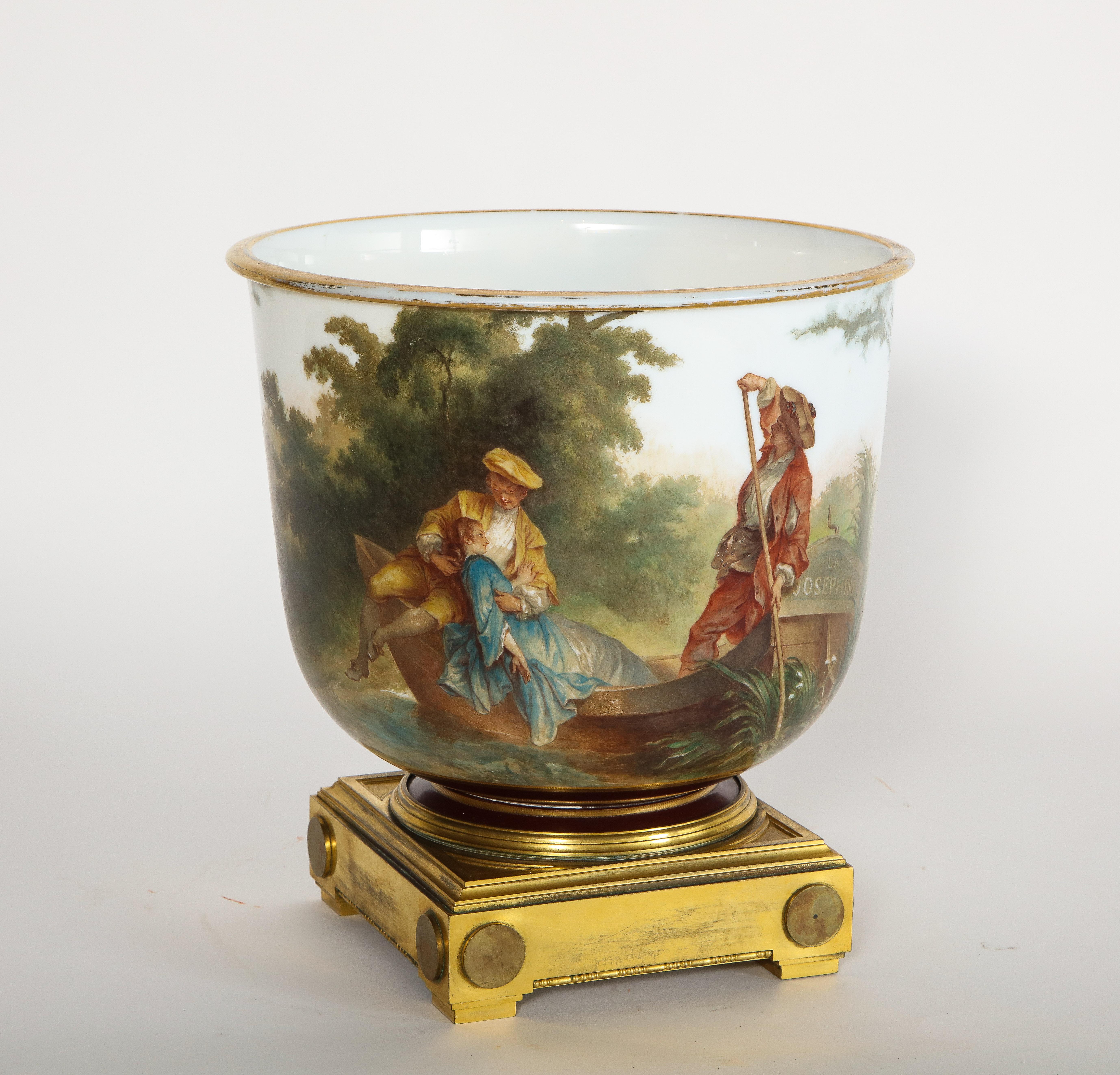 A fabulous, quite important and large signed Baccarat white opaline crystal hand painted centerpiece/jardiniere/planter with Watteau/Neoclassical landscape and river scene. This extraordinary piece is artfully crafted by the best crystal