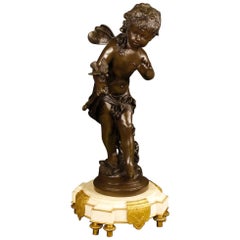 Sculpture française en bronze signée représentant le message d'Auguste Moreau