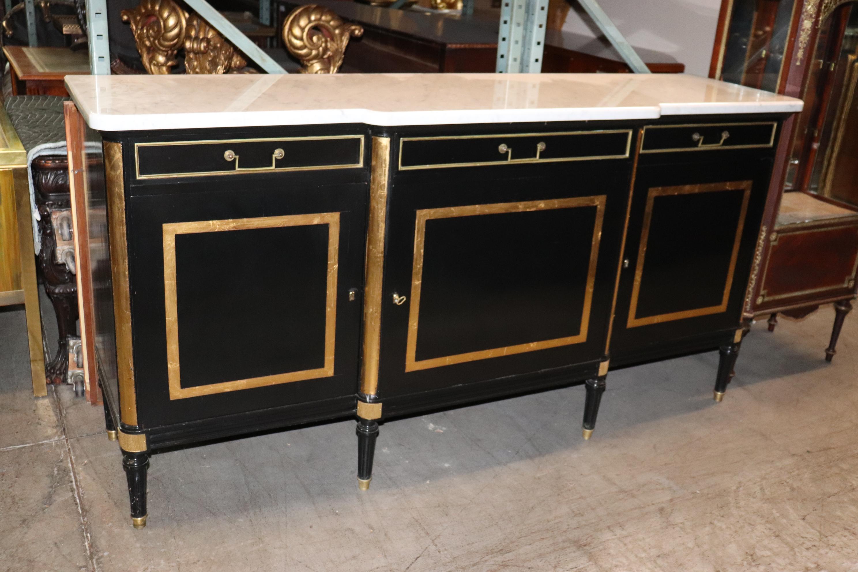 This includes professionally made shelves, brass pins and a full detail to the best possible condition for the customer:

This is a superb Maison signed Jansen Directoire sideboard. The sideboard is done in ebonized black lacquer and has gold leaf