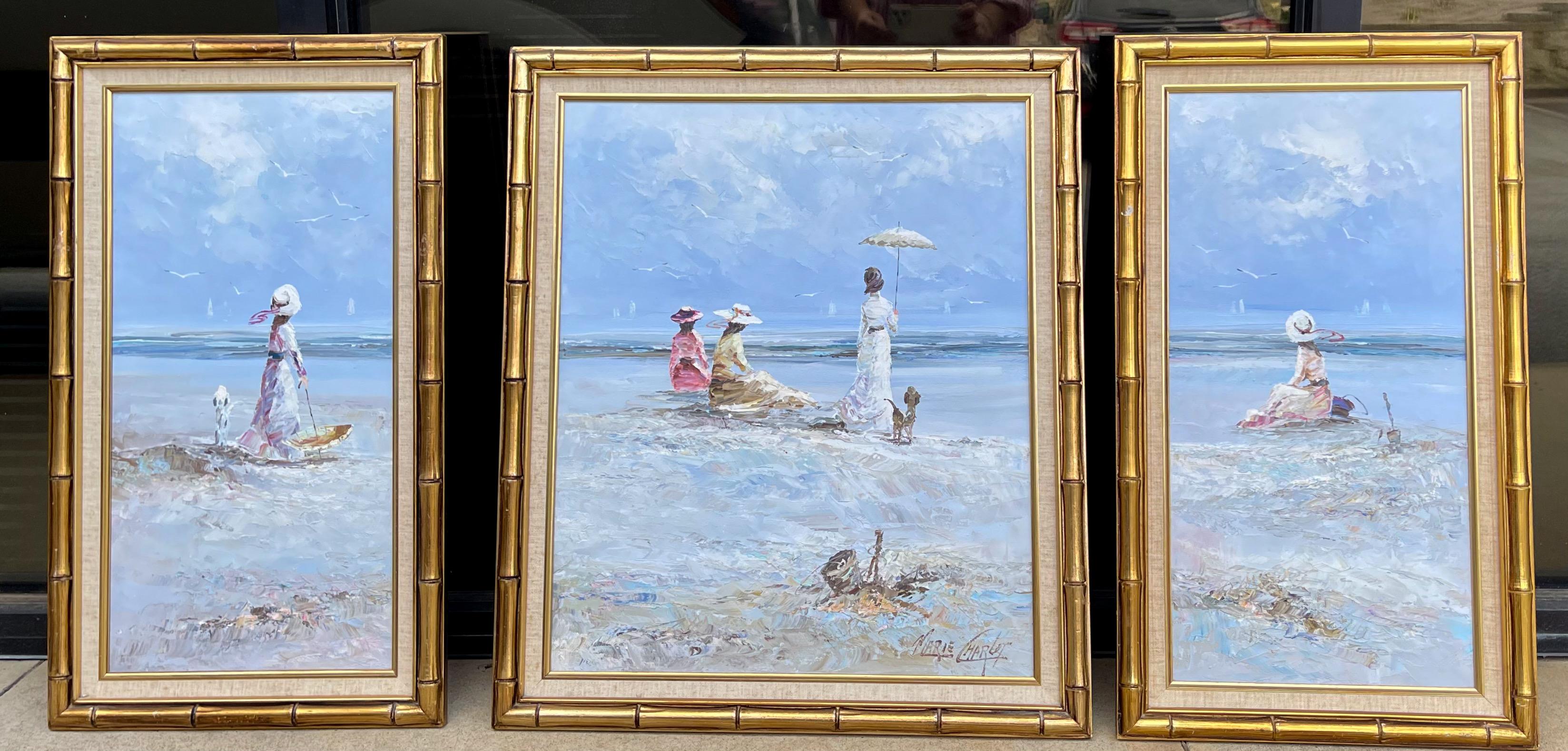 These are lovely and reminiscent of another time! This is a set of three French beach scenes by Marie Charlot. They were part of her “Ladies at the Beach” collection. They are signed and in faux bamboo giltwood frames. They date to 1990 and are in