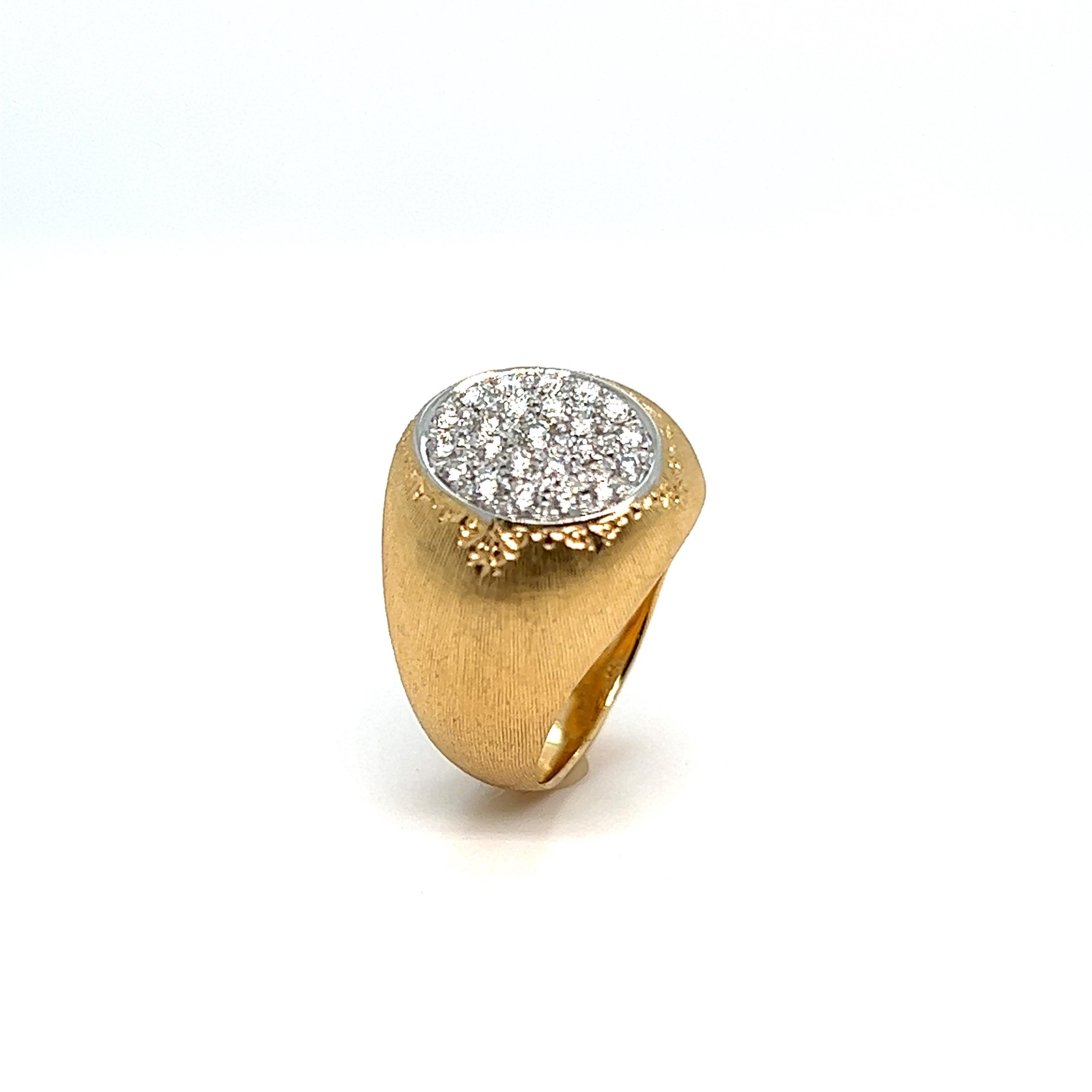 Discover a magnificent brushed French signet ring lightly chased with flowers topped with pavé diamonds, a truly exceptional piece of jewelry that embodies the Baroque style. Crafted with care and expertise, this 18-carat yellow gold signet ring