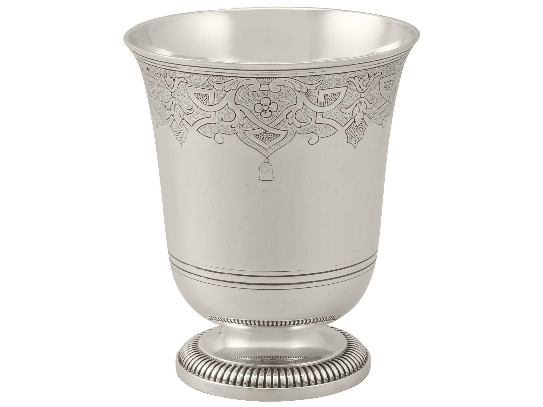 An exceptional, fine and impressive antique French silver beaker made by Emile Puiforcat; an addition to our continental silverware collection.

This exceptional antique French silver beaker has a plain cylindrical rounded form.

The upper