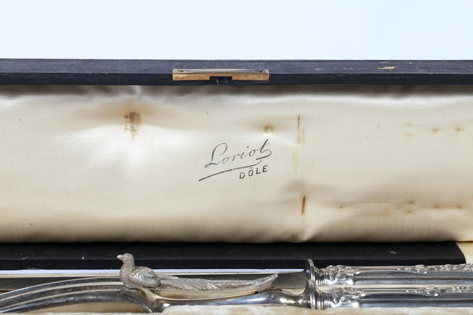 The House of Antiques Royal sterling silver makers mark for Henry Soufflot (1884-1910), the foliate cast handles monogrammed GM, the fork with hinged long-tailed bird to the stem, the knife blade stamped PARIS, houssed in a leather case initialled