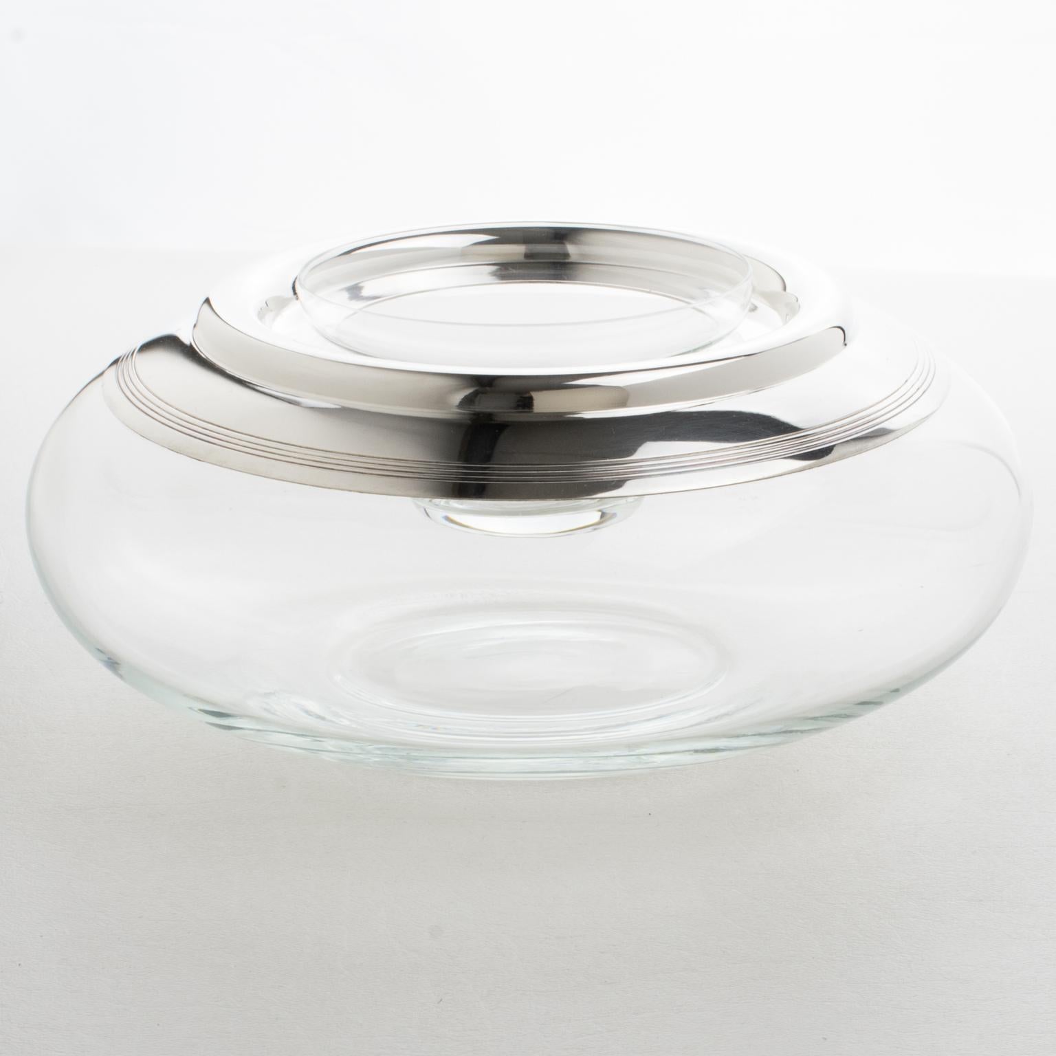 Stylish Mid-Century silver plate and crystal caviar serving bowl, dish, or chiller designed by French silversmith St Hilaire in the 1960s. Chic design with geometric streamline shape, featuring a large puffy crystal container with silverplate metal