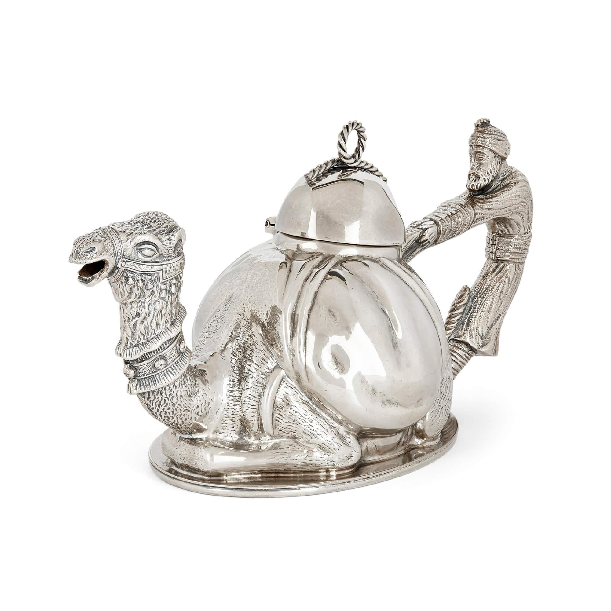 French silver-plated teapot with camel design 
French, 20th Century
Height 14cm, width 27cm, depth 12cm

Produced by the much-esteemed Parisian tea company Mariage Frères, this delightful teapot, titled 'Karawan', is a fine example of creative