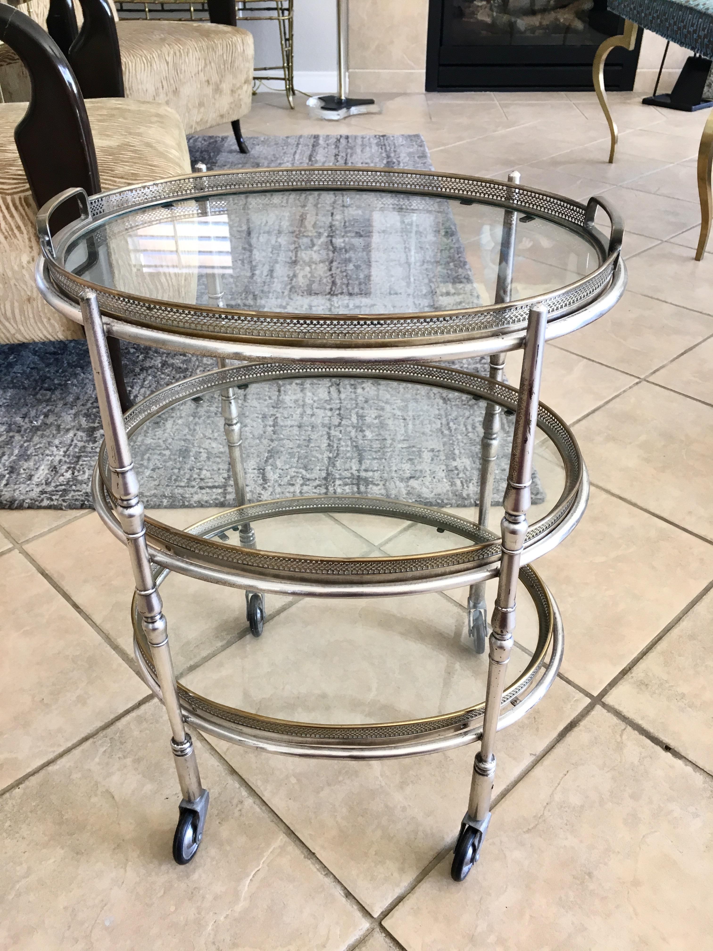 Diminutive French three-tier silver plate serving cart (tea/bar cart) with inset glass shelves. Refined details in the delicate gallery. Each tray is removable.