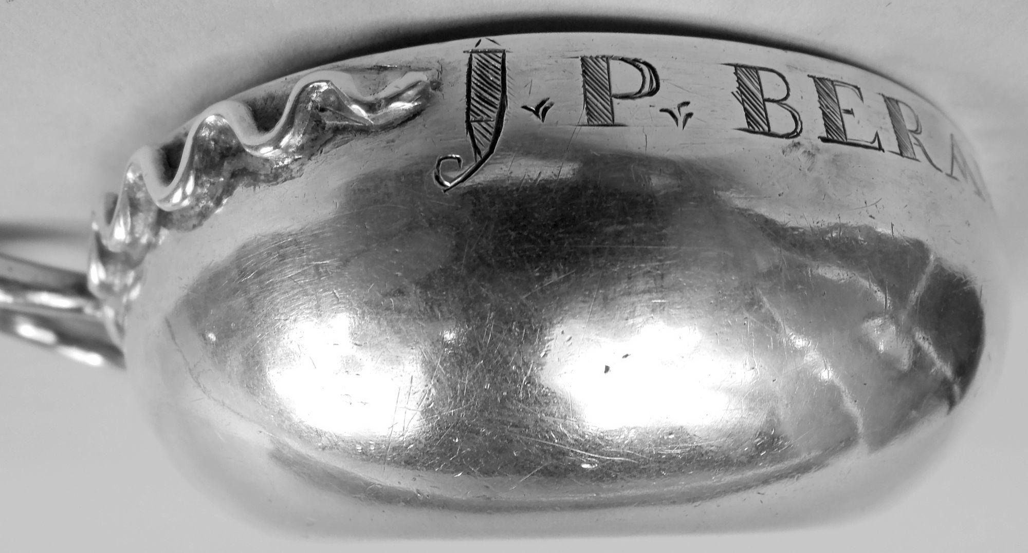French silver wine taster, 18th century. Round with curved sides; snake ring handle has squiggly tail. Engraved owner’s name in shaded block: J. P. Berard Ptre. That last is a shortened version of “prêtre” or priest. Under the Ancien Regime