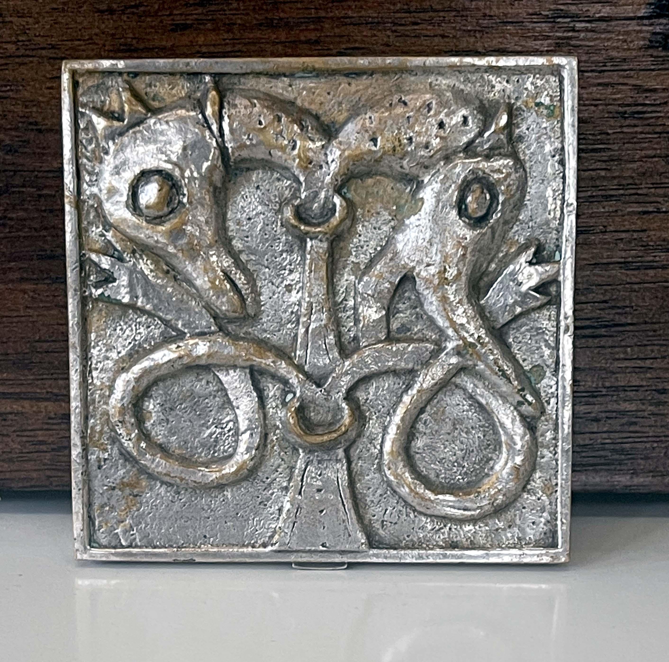 A silvered bronze Poudrier 