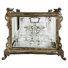 French Silvered Bronze Cut Crystal Tantalus Set, Decanters and Glassware