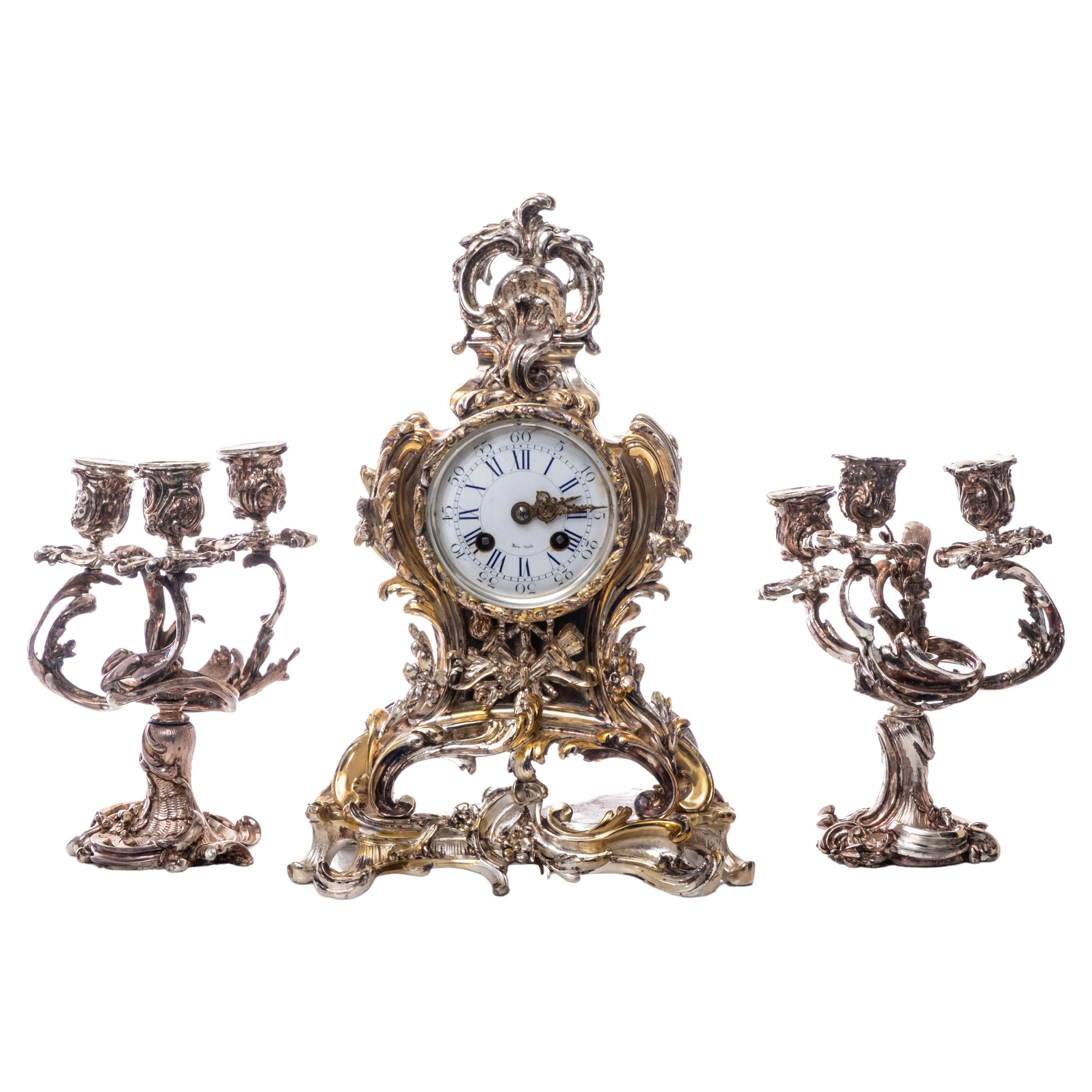 French Silvered Bronze Garniture Clock Set