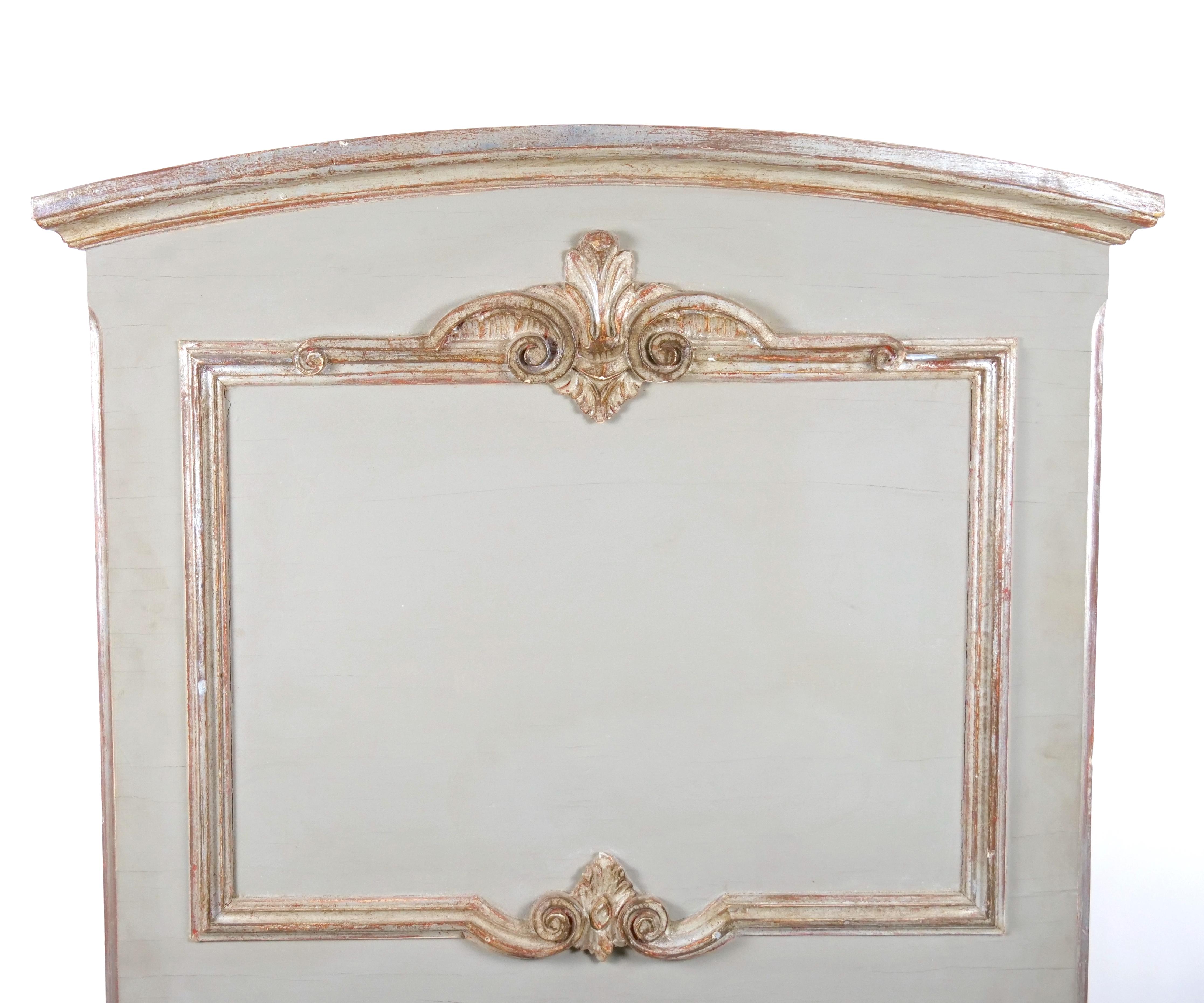 
Immerse yourself in the enchanting world of French sophistication with this exquisite trumeau wall mirror. Crafted with meticulous artistry, it features  stunning silvered and gilt wood hand-painted frame that emanates opulence and elegance. The