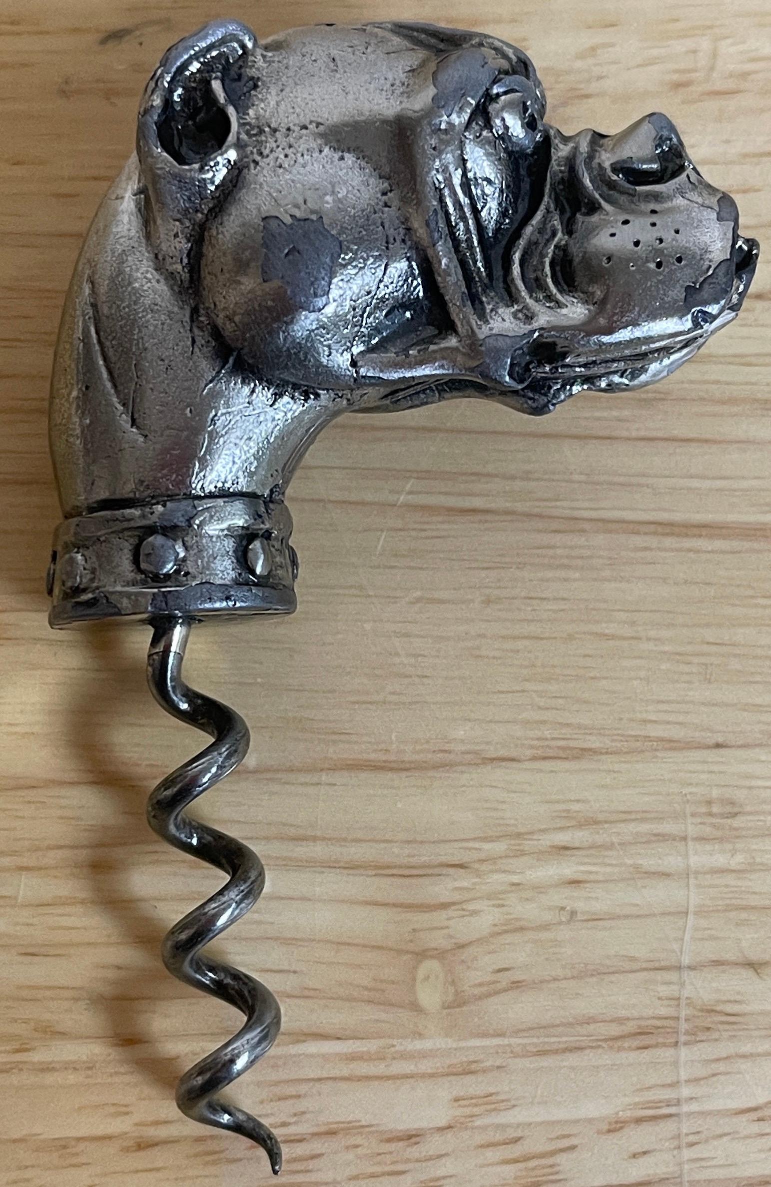 French silvered gun metal & steel dog motif corkscrew, C 1900s
A three dimensional dog head with collar. A whimsical depiction of heavy gauge, highly detailed, beautifully worn and distressed. Ready to use.
Overall measurements
4-inches high x