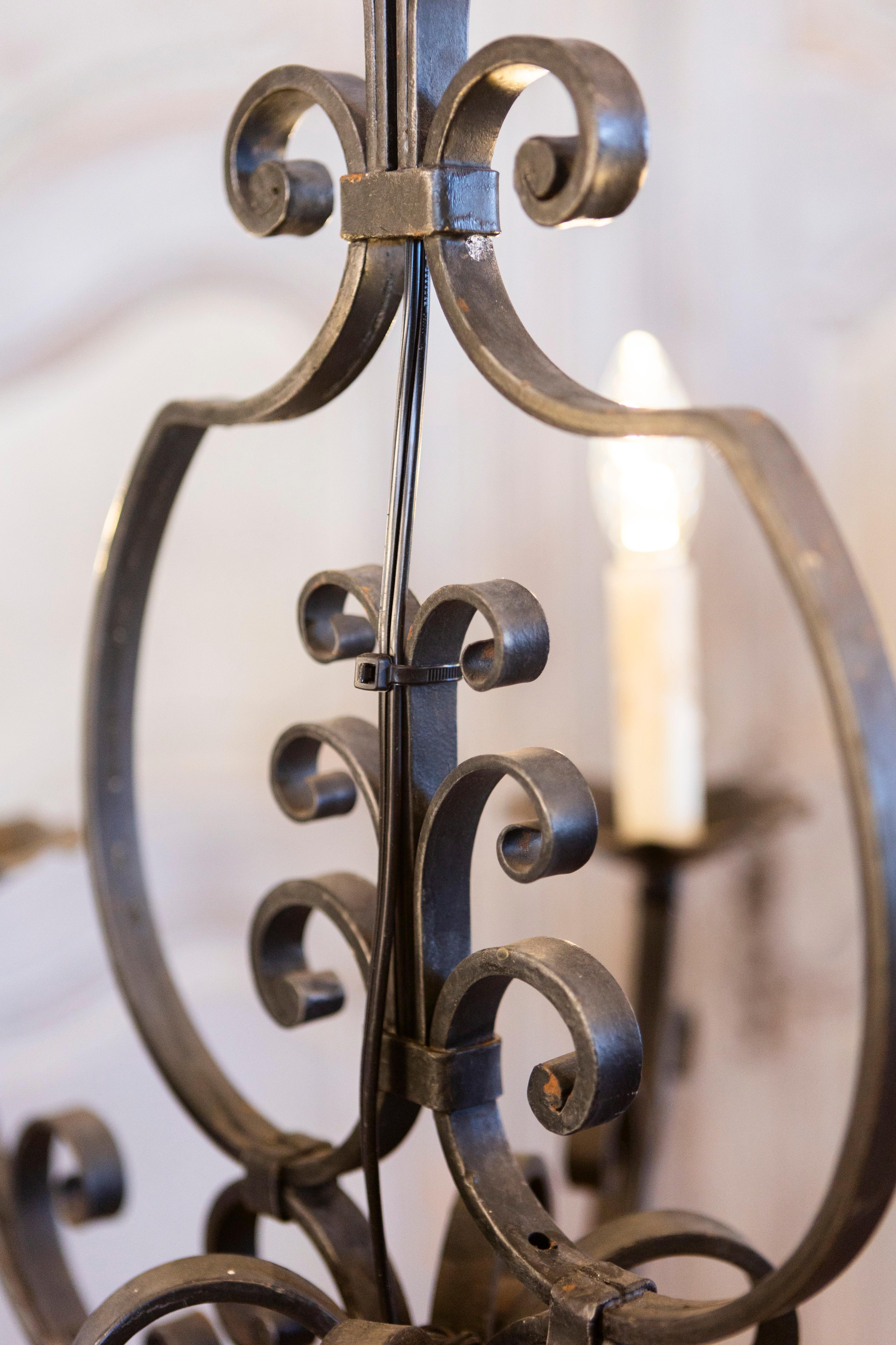 20th Century French Six Light Wrought Iron Chandelier with Cascading Scrolls, USA Wired For Sale