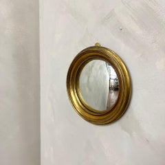 Pequeño espejo convexo dorado francés de los años 50