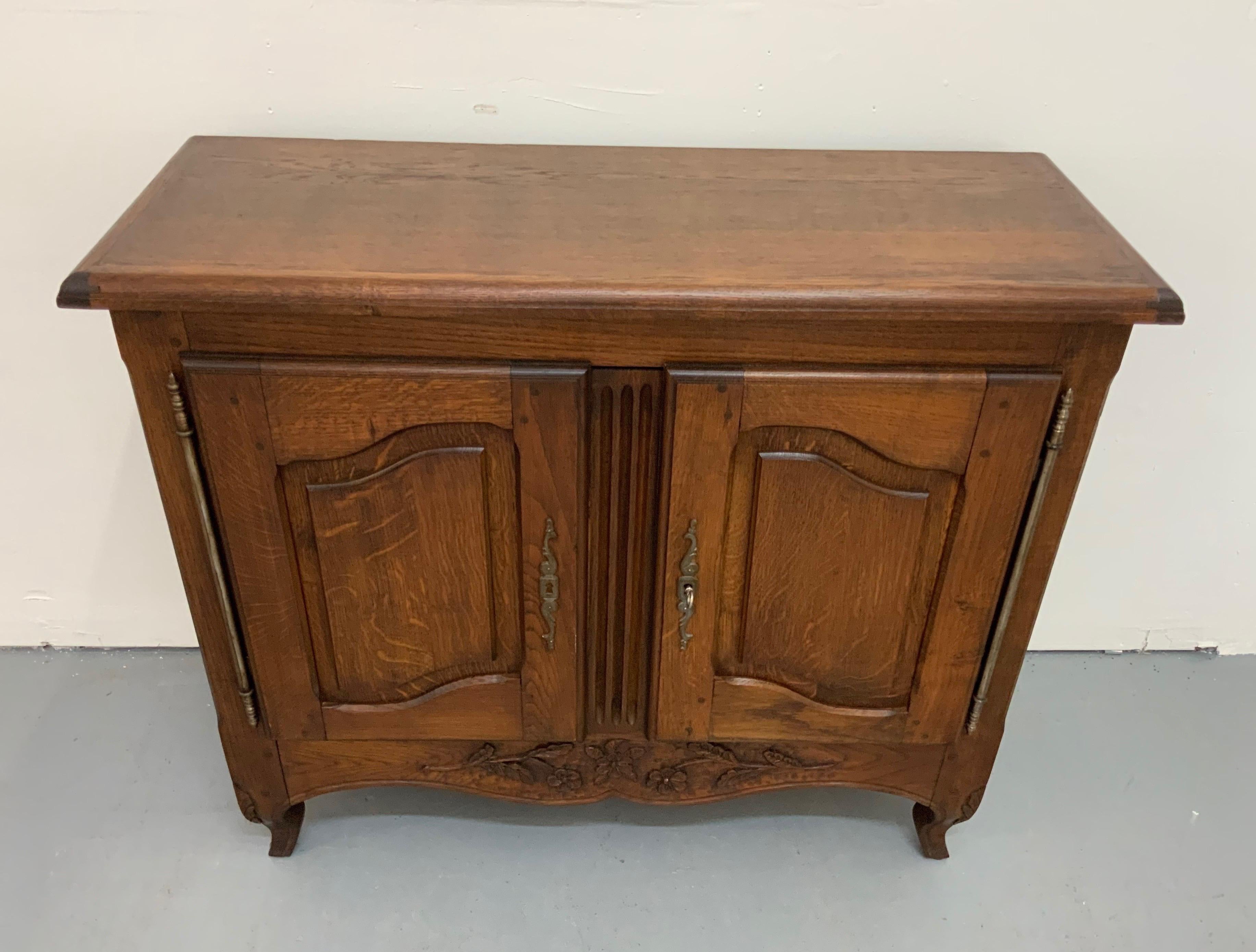 French antique small Buffet Louis XV style with 2 doors, from 20th century made in walnut and varnished.