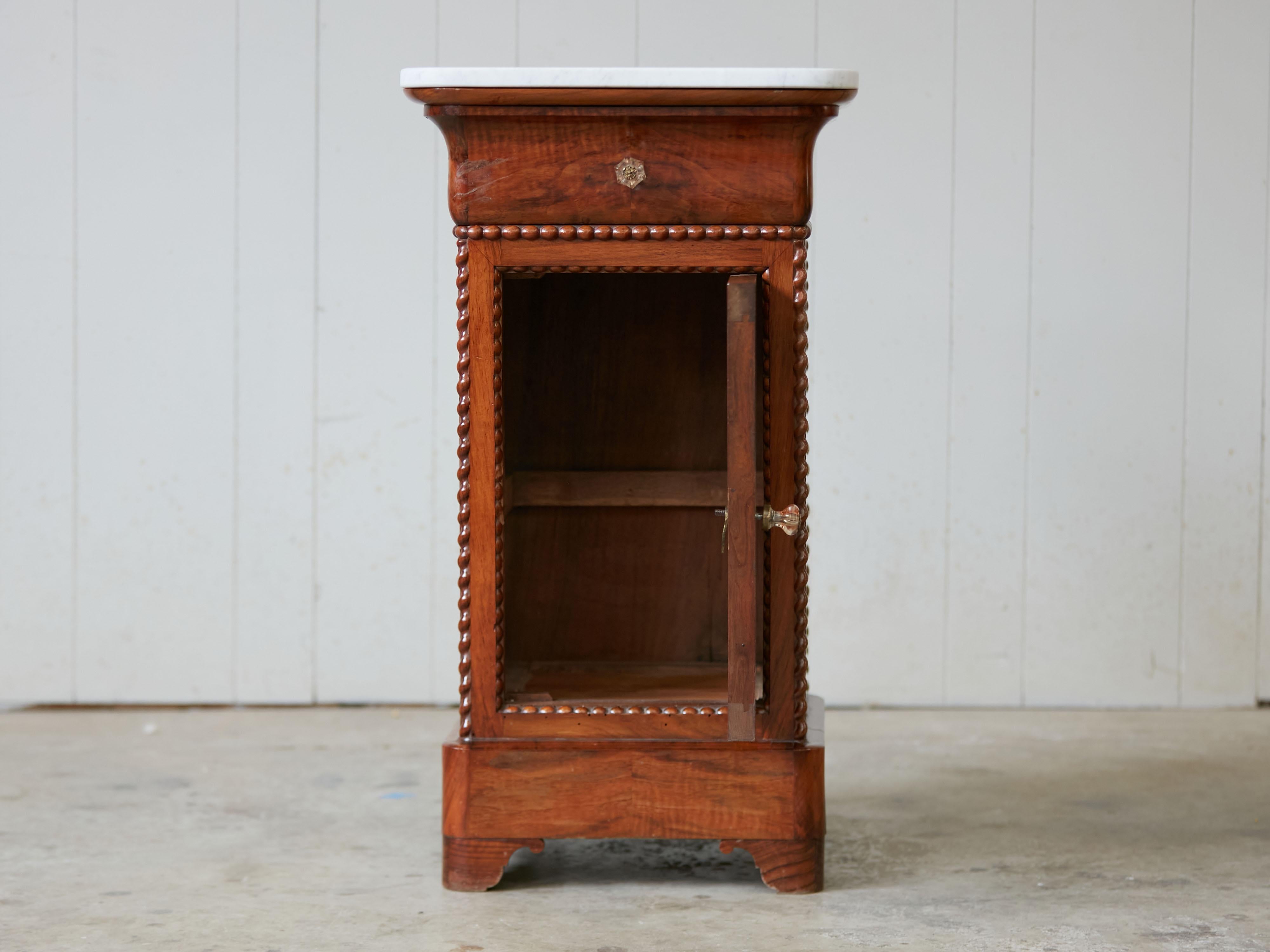 small marble top cabinet