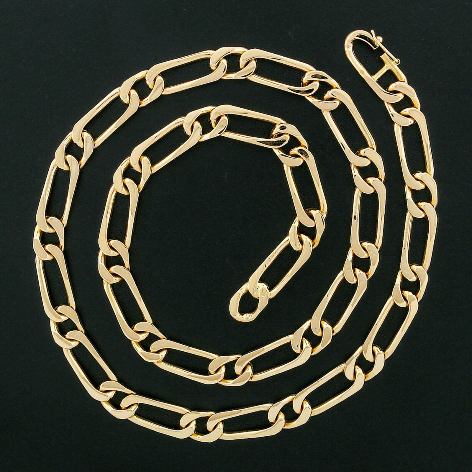 This very well made chain necklace was crafted in France from solid 14k rosy yellow gold. The 23 inch long necklace features fine and solid unique link design that easily stands out and makes a bold statement when the chain is worn around the neck.