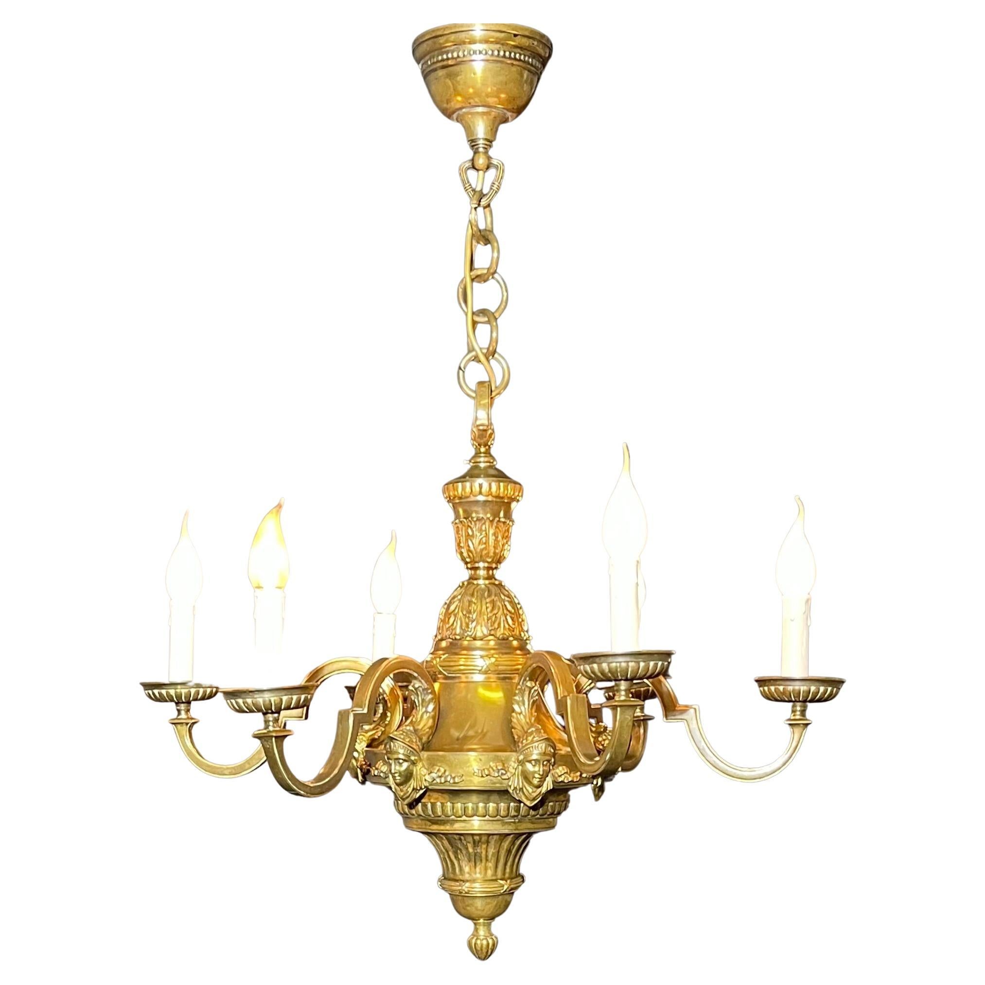 A large Louis XVI style six-light massiv bronze chandelier, France, circa 1900s.
Socket: 6 x e14 for standard screw bulb (newly rewired).

 
