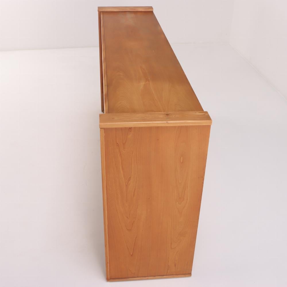 Elm French solid elm sideboard with bar section by Maison Regain, C 1970. For Sale