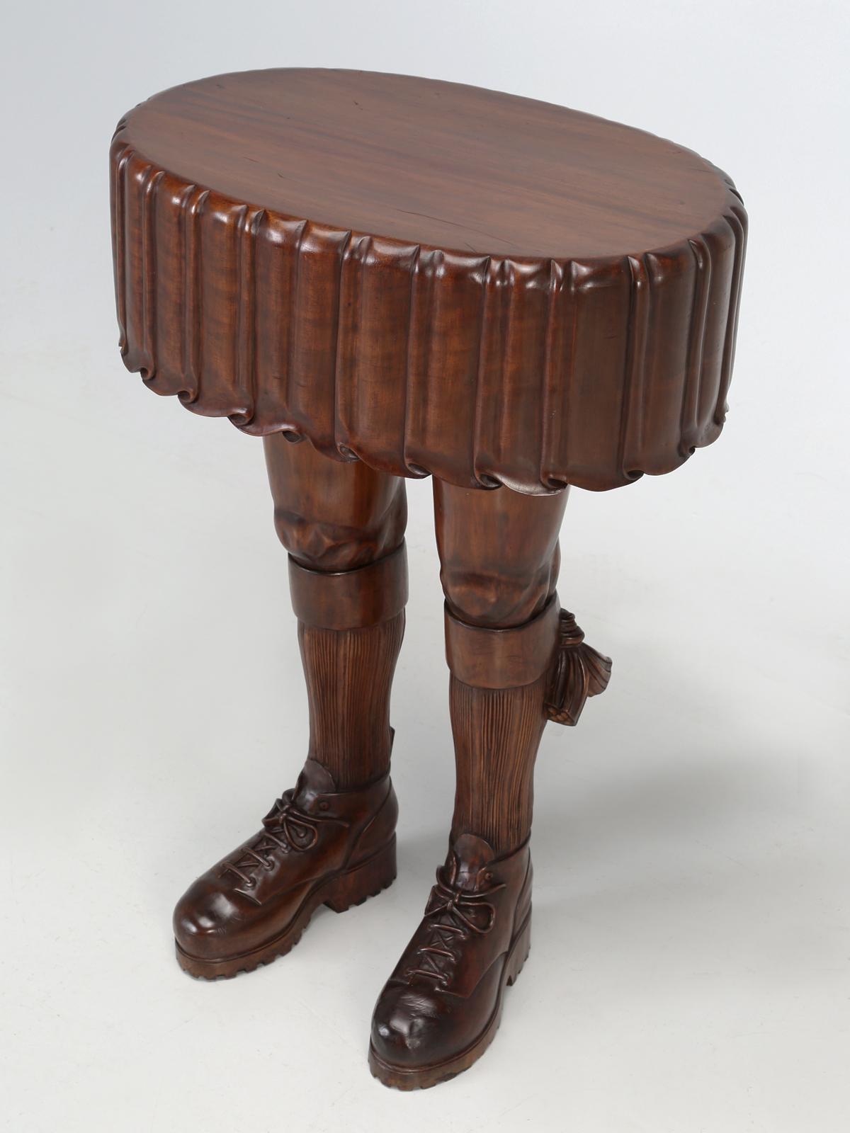 Not completely sure, if I would call this end table or side table, Folk Art, or exactly how I would describe it? Clearly, whomever carved this mahogany side table, was a master wood carver and that becomes quite apparent, when you take a hard look