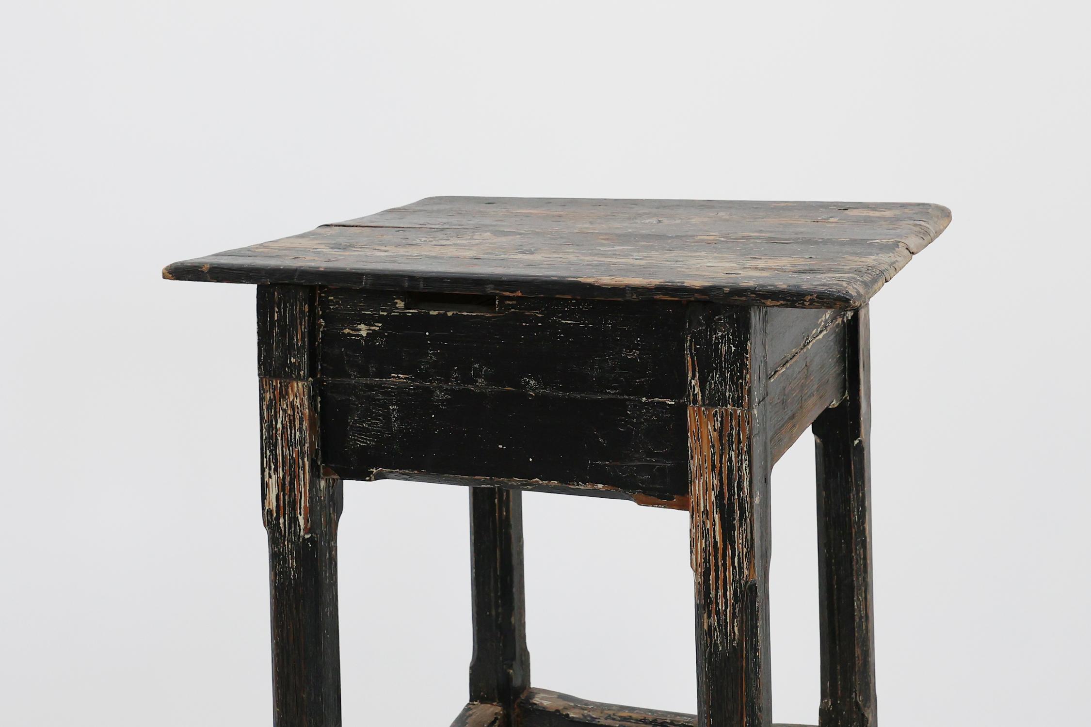 Rustic French solid oak black side table in wabi sabi style, ca. 1850 For Sale