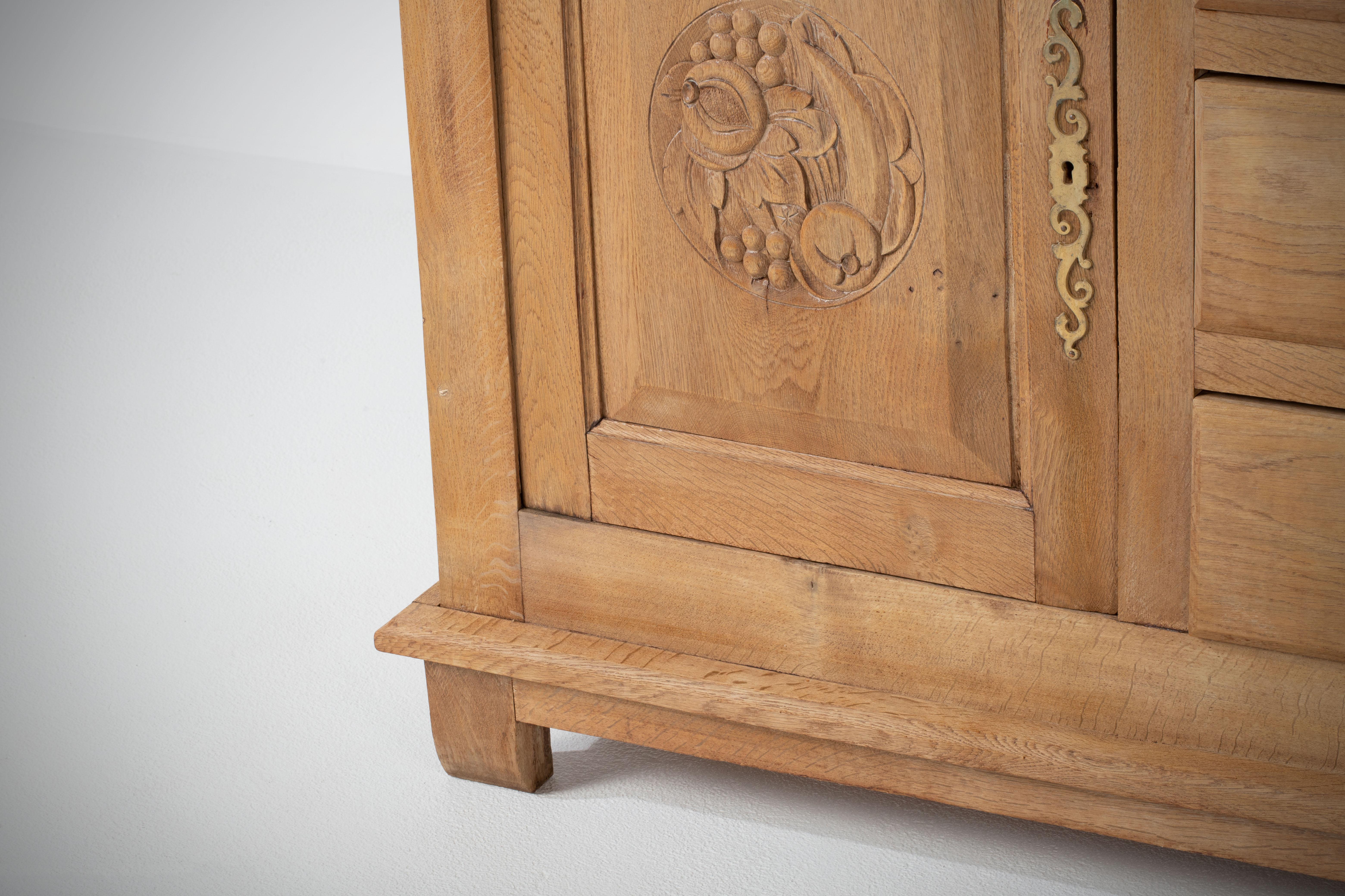 Mid-20th Century French Solid Oak Credenza with Hand-Carved Details, 1940s For Sale