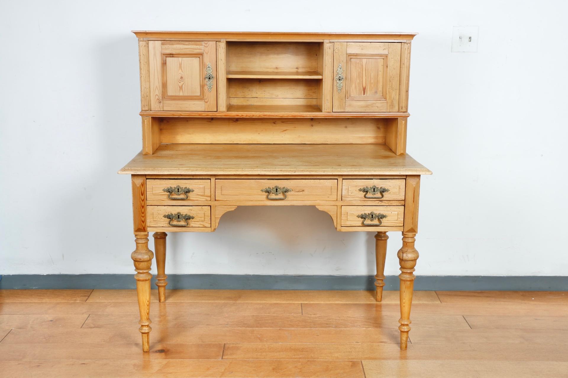 Rustic French 2 piece oak wood secretary desk with metal hardware. Beautifully designed and made. Has dovetail on drawers and connections. Solid sculpted legs. Great for any office and has lots of desk space.
