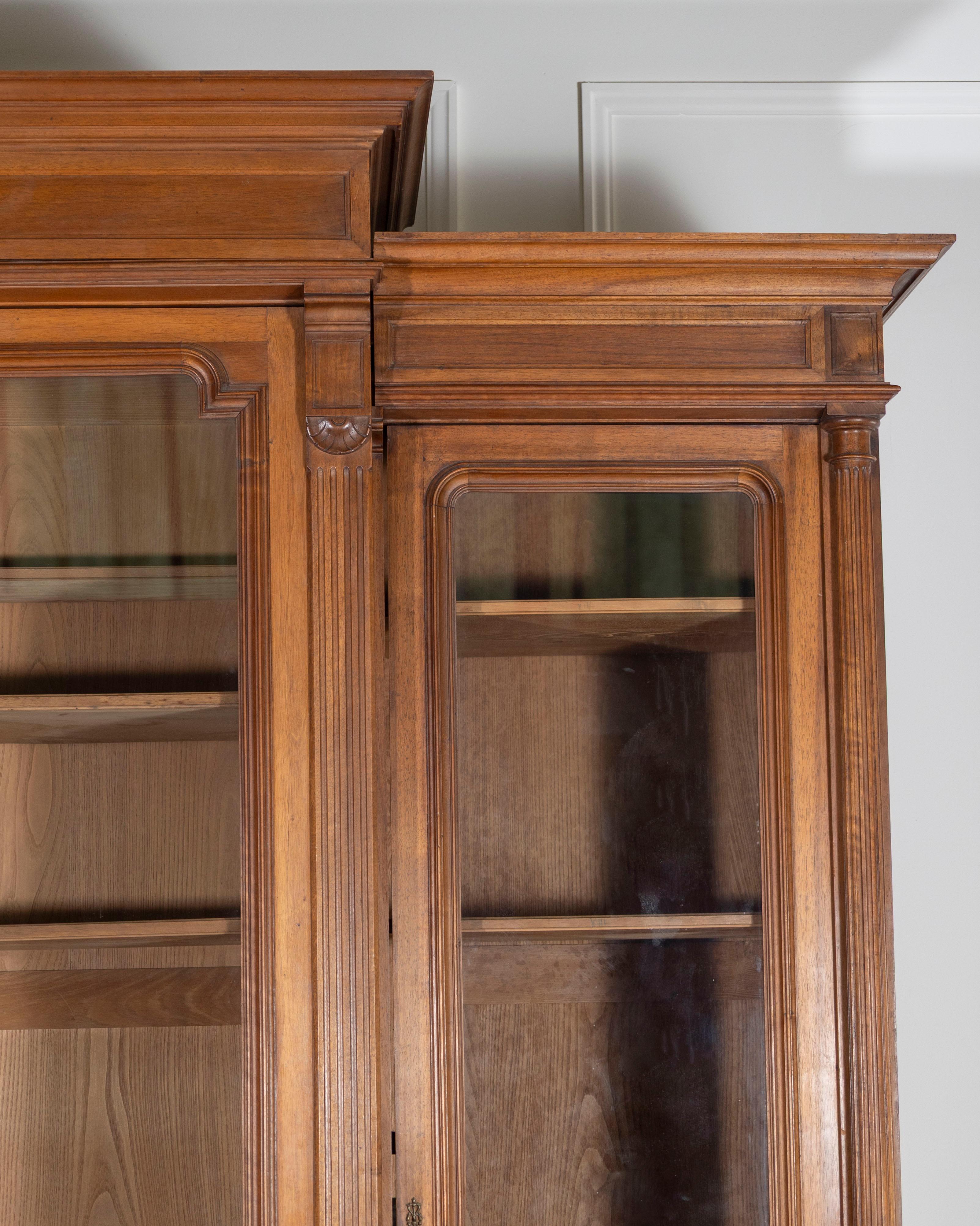 French Solid Walnut Bookcase with Carved Columns, Late 19th Century In Good Condition For Sale In Atlanta, GA