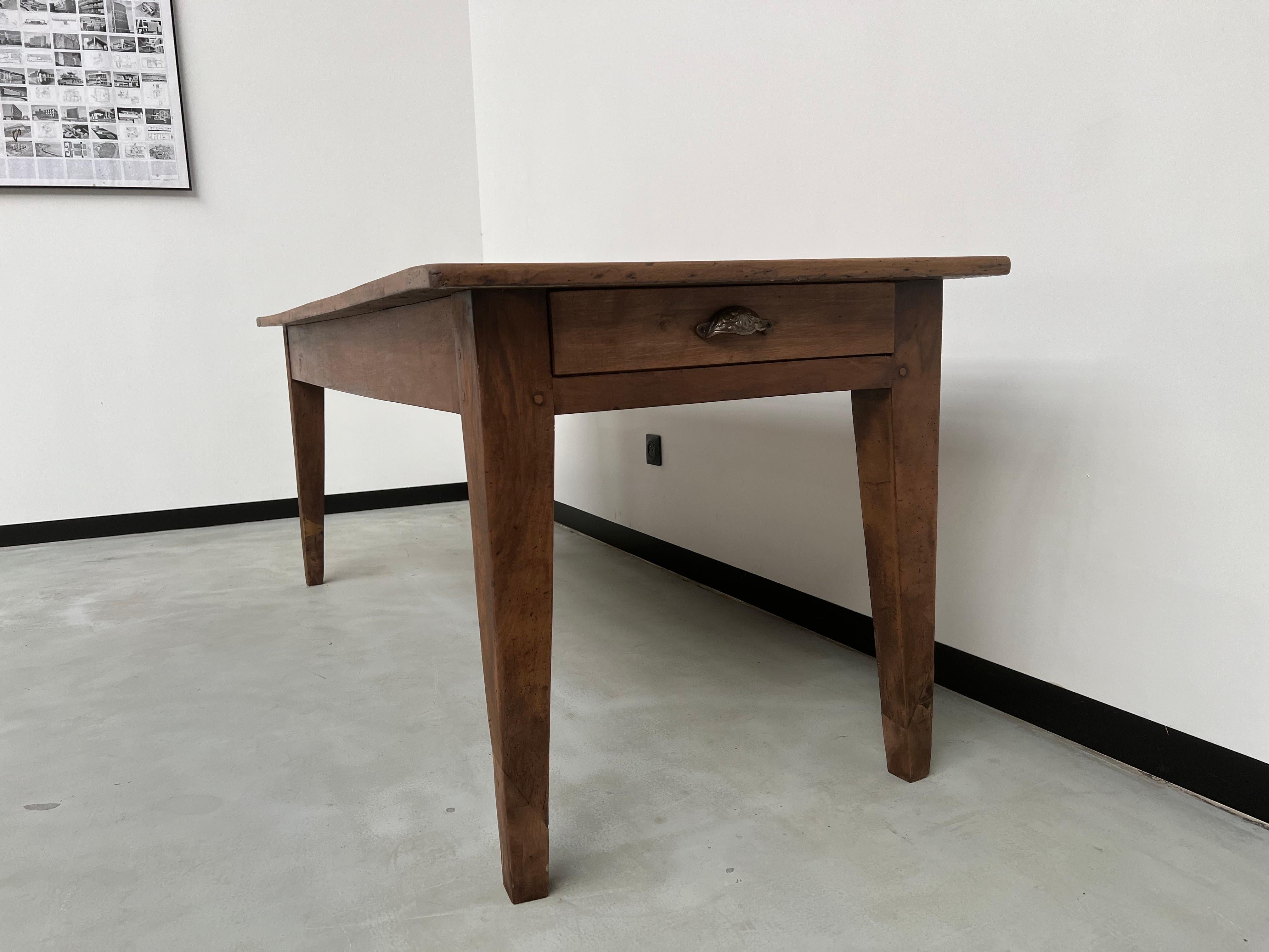 Walnut French solid walnut farm table with spindle legs For Sale