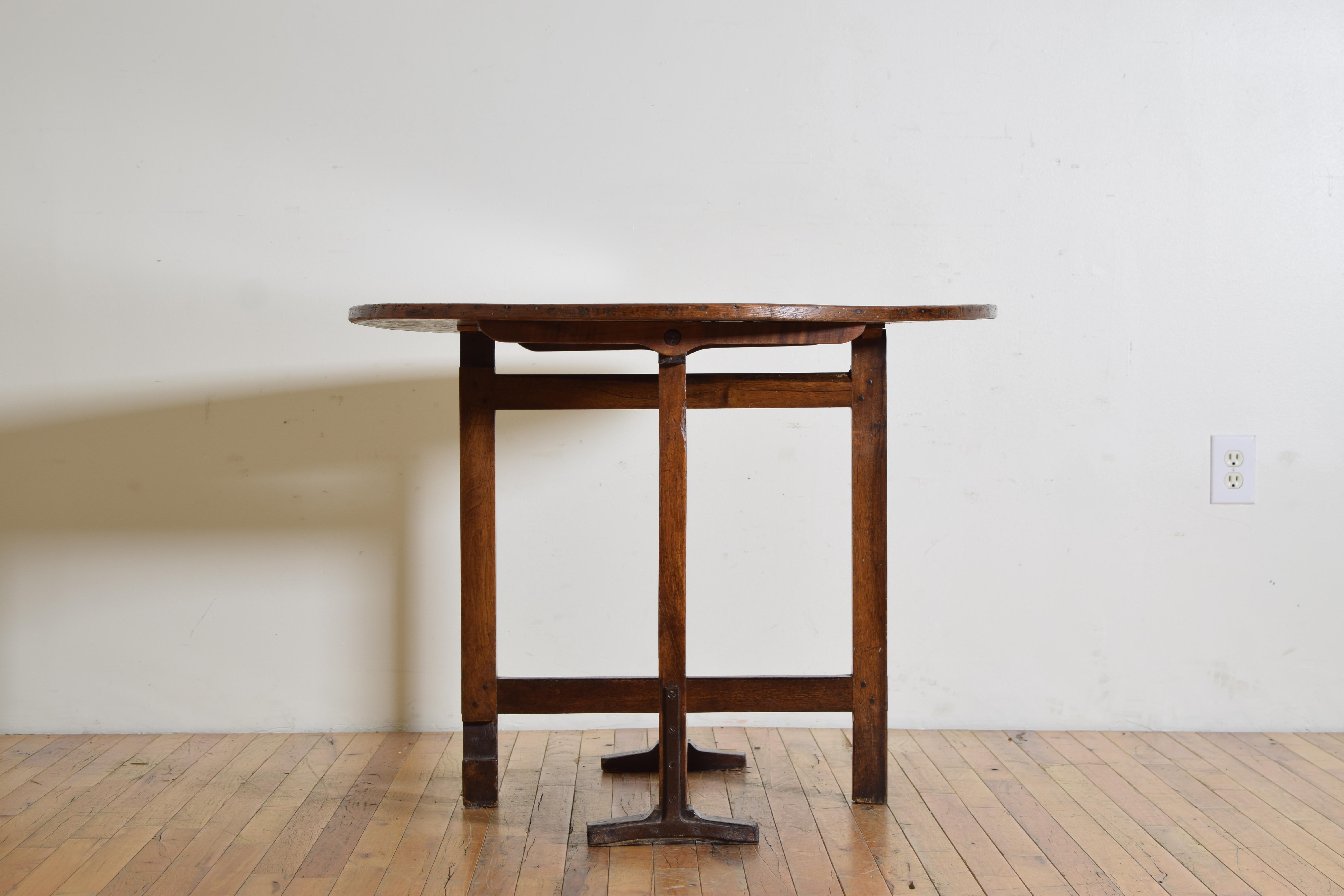 19th Century French Solid Walnut Folding Oval Vineyard Table from the mid 19th century