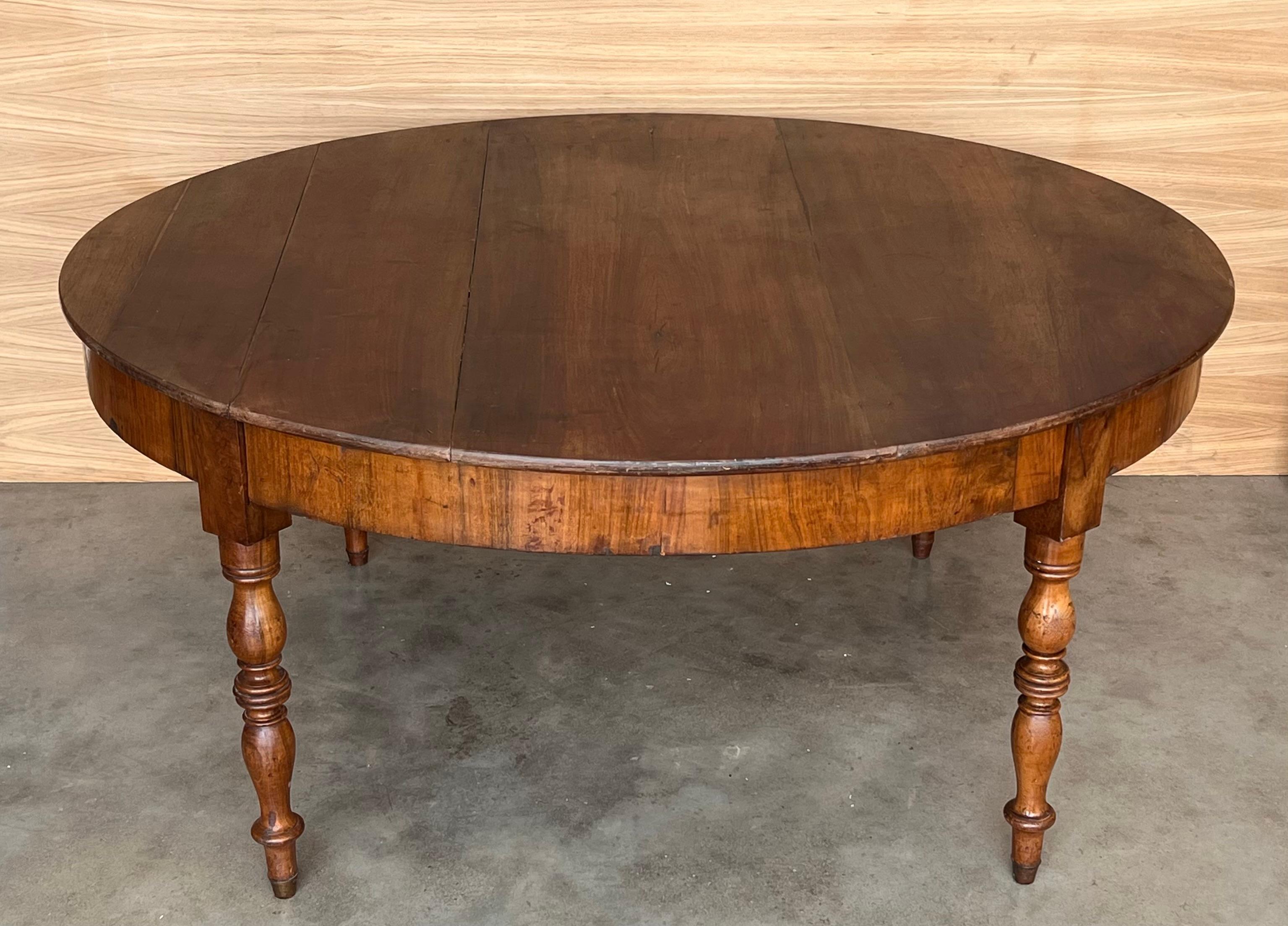 19th Century French Solid Walnut Oval Center Table with Four Turned Legs For Sale
