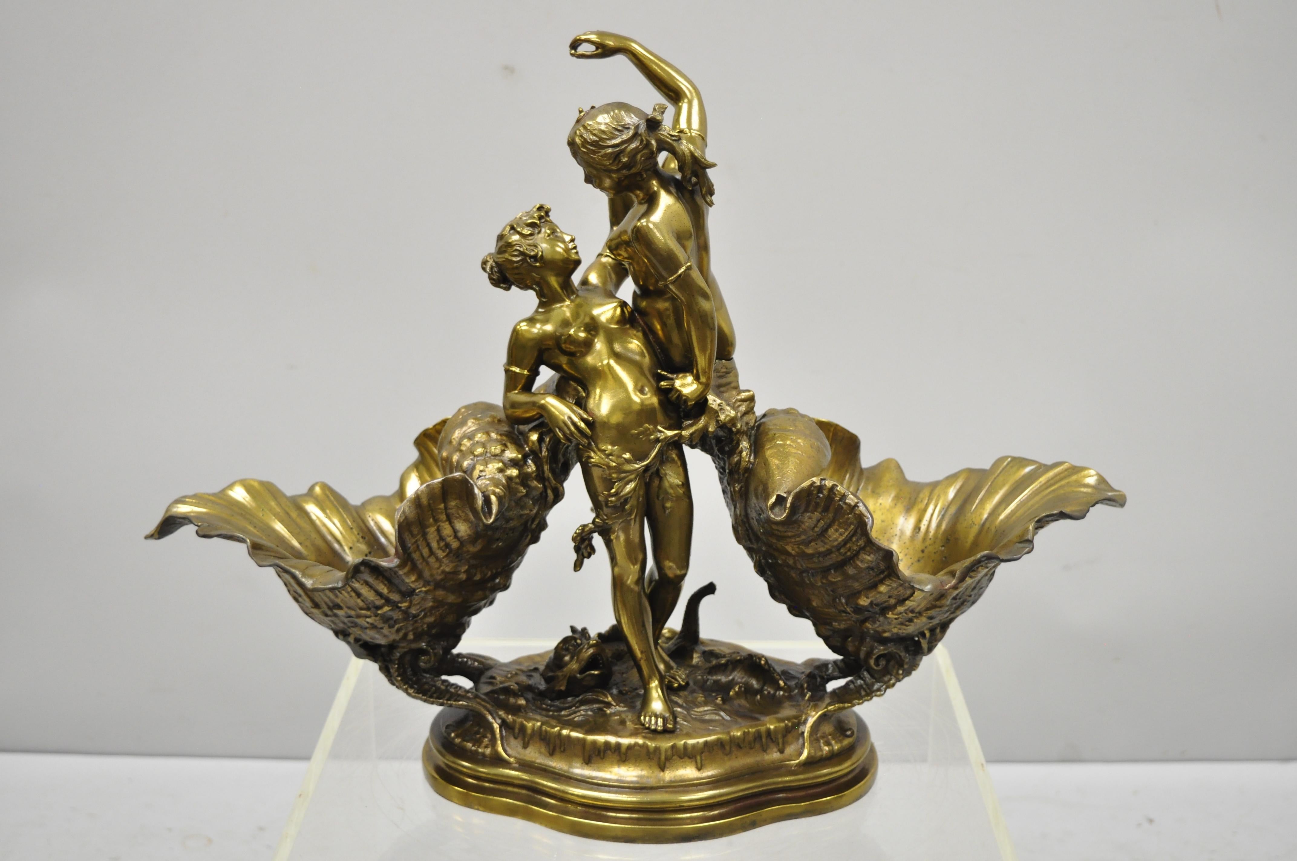 French Spelter bronze finish centerpiece sculpture, Charles Georges Ferville Suan. Item features cast spelter metal sculpture, bronze patinated finish, double woman maiden figures, shell double dishes, serpent to base, marked 